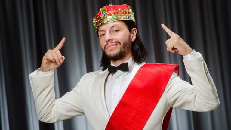 Funny king wearing crown in coronation concept