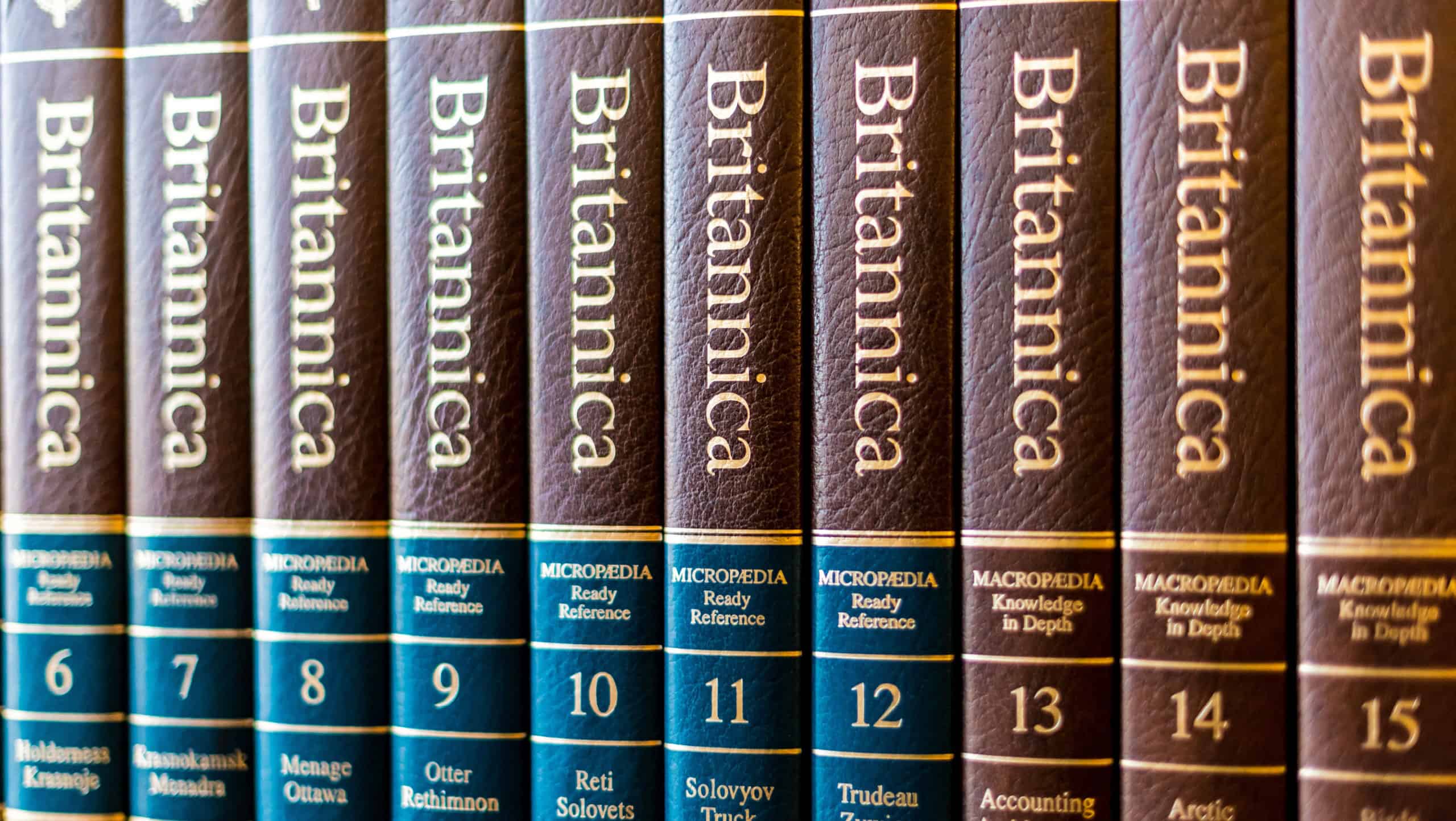 POZNAN, POL - DEC 11, 2019: Encyclopedia Britannica volumes on a shelf in a public library