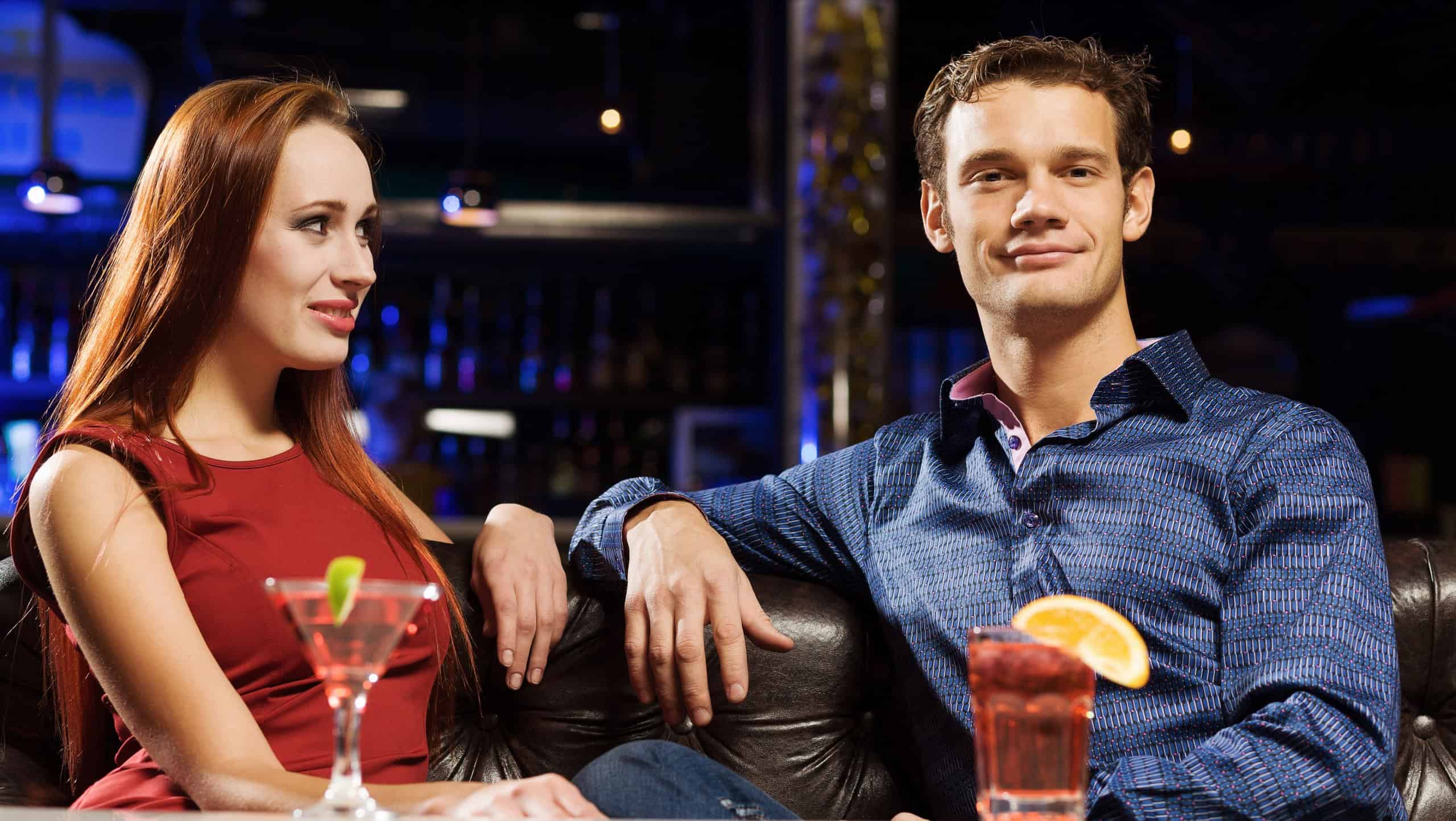 Young handsome man accompanied by elegant lady
