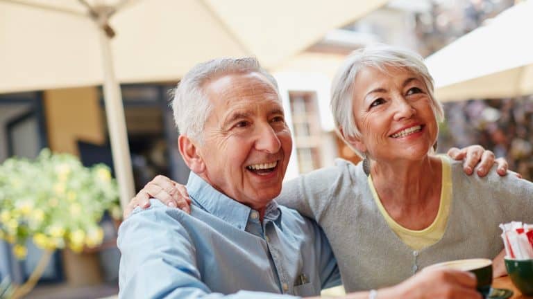 The golden years are going great. Shot of a senior couple having coffee at a cafe.