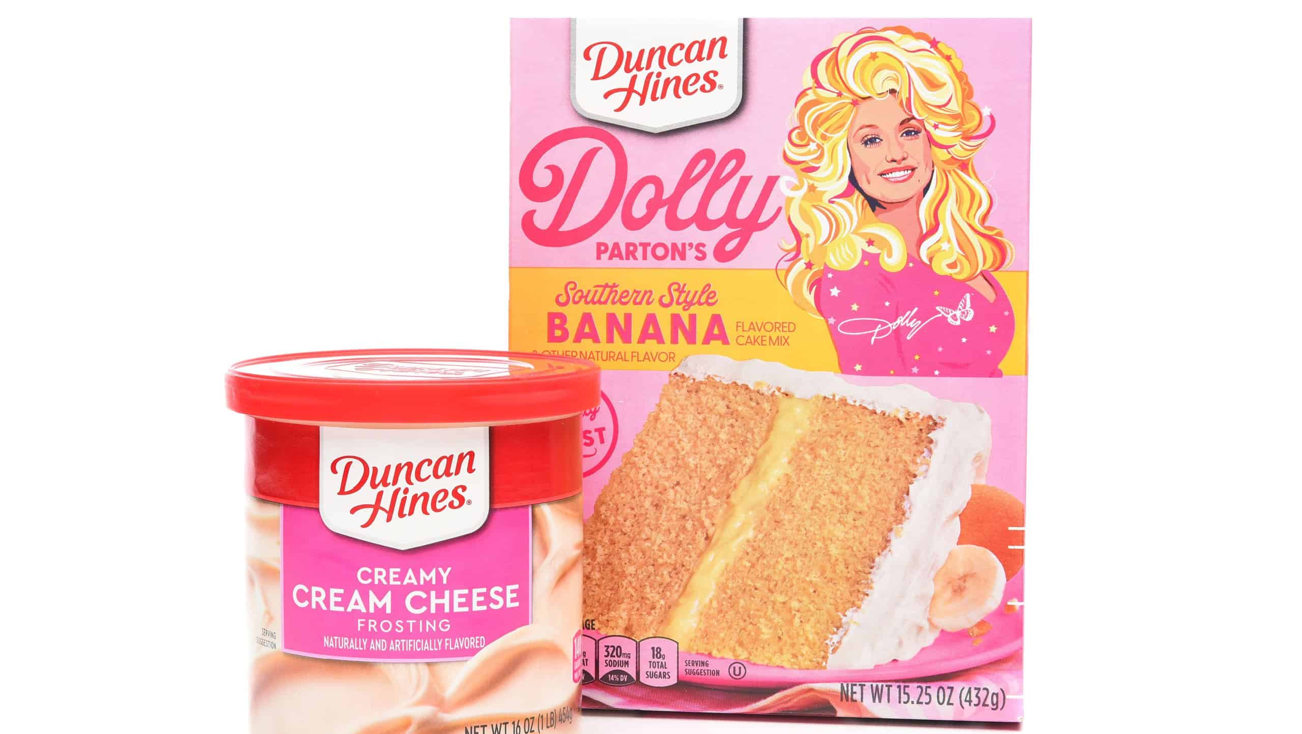 IRVINE, CALIFORNIA - 1 APR 2022: A box of Dolly Parton Southern Style Banana Cake mix with a can of Cream Cheese Frosting from Duncan Hines.