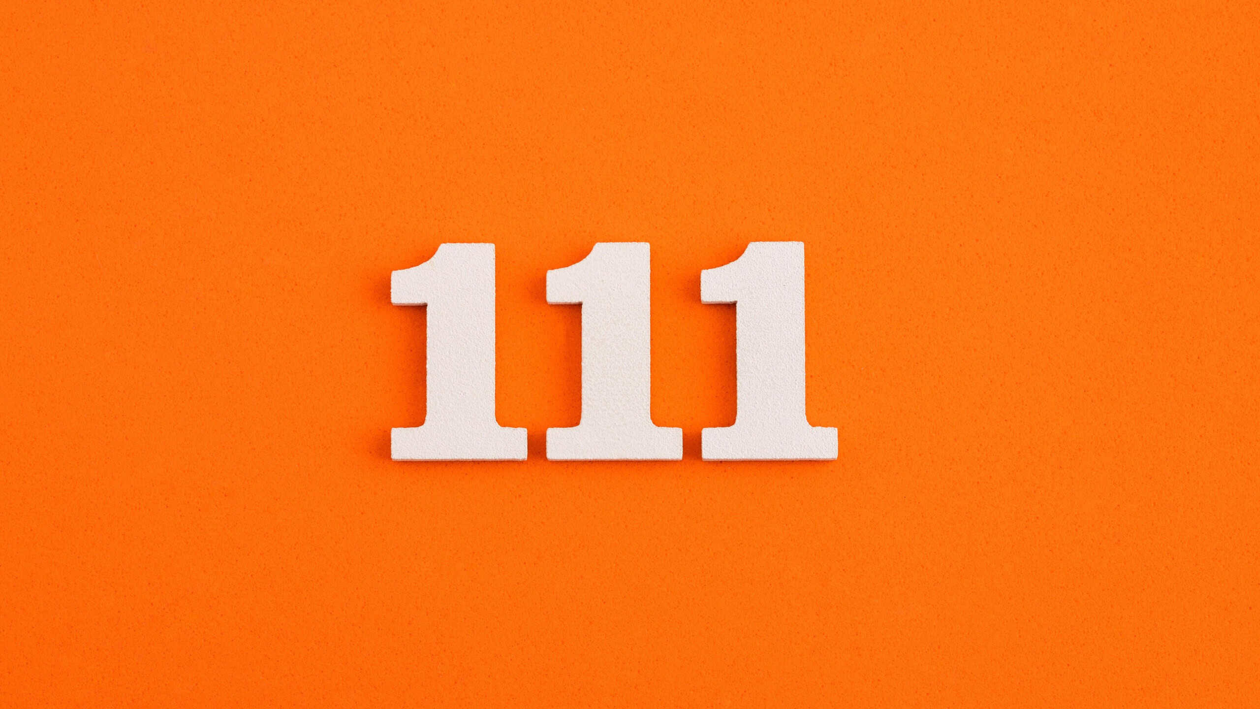 111 On orange foam rubber background