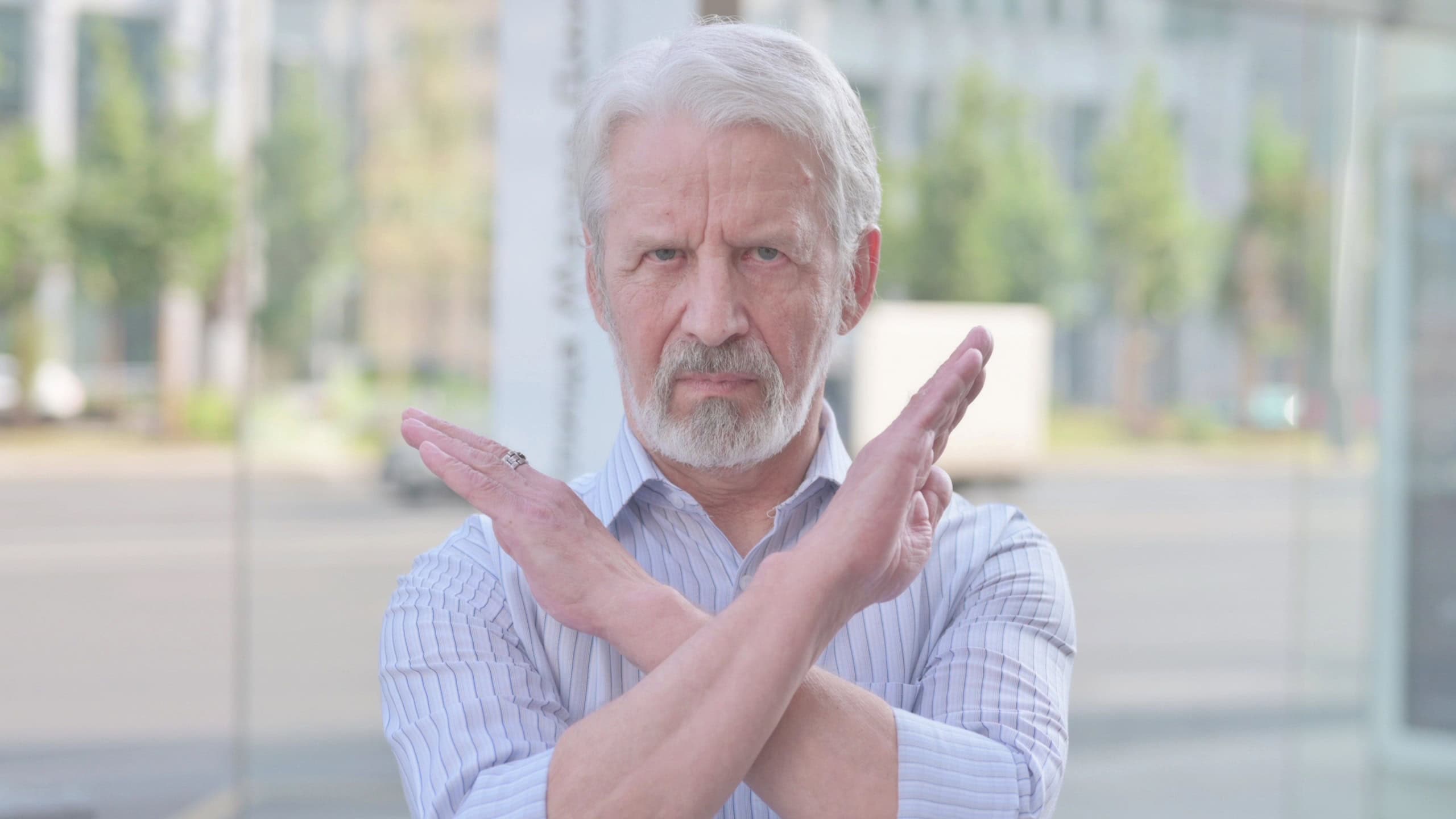Portrait of Rejecting Old Man Doing No Gesture Outdoor