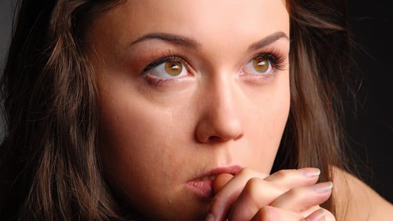 Praying woman in deprassion