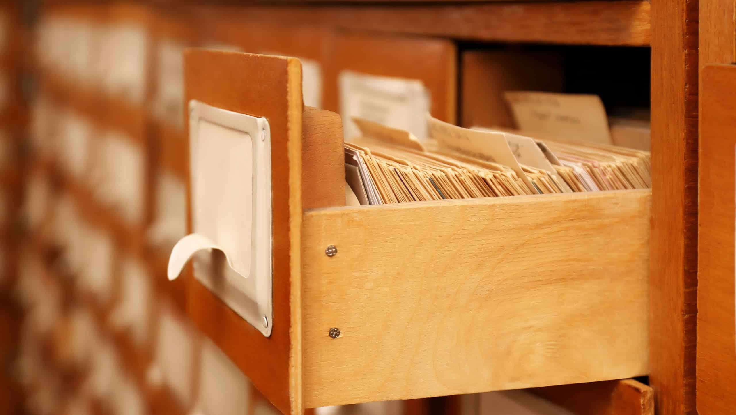 Closeup view of library card catalog drawers