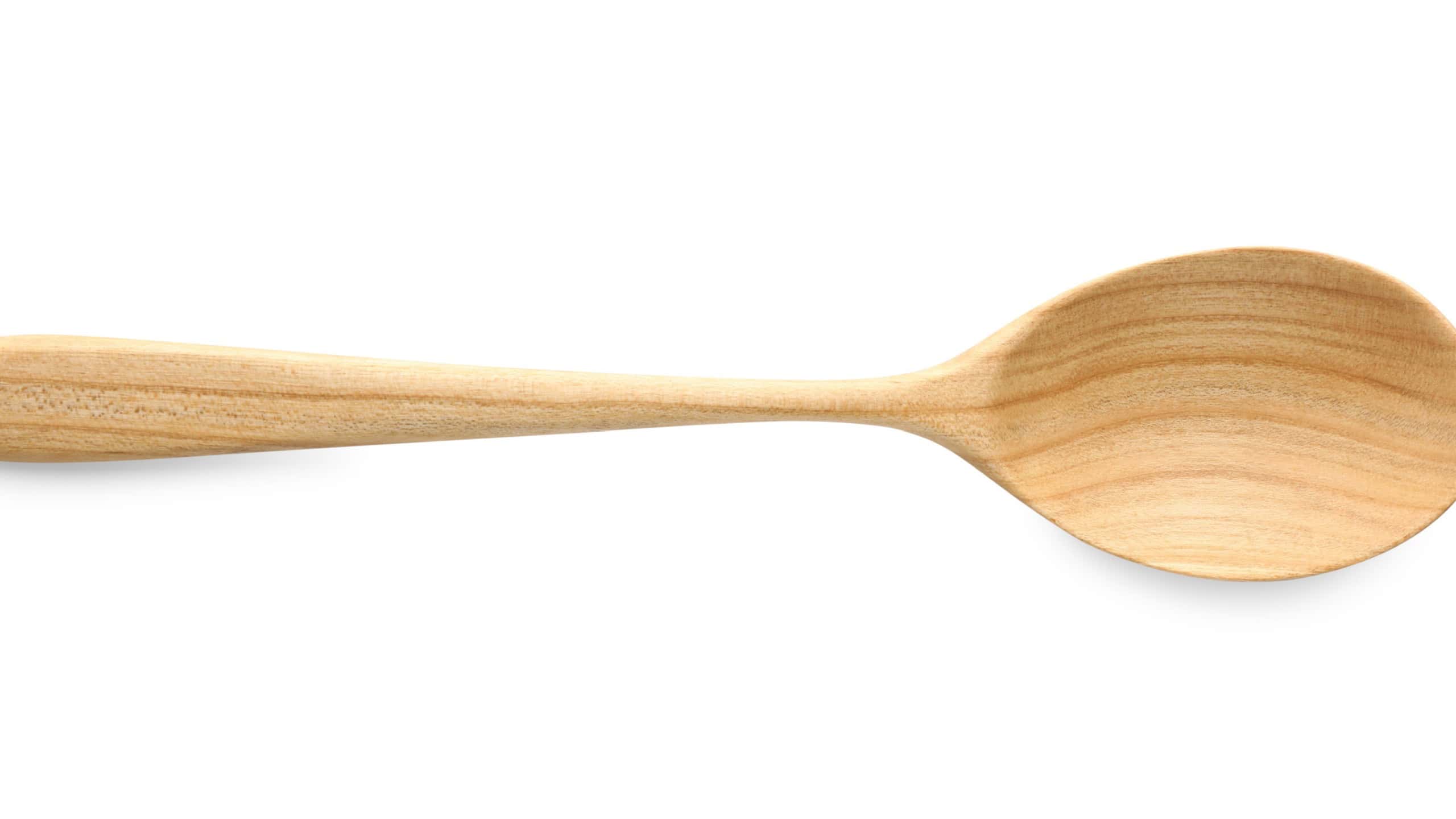 One empty wooden spoon isolated on white, top view