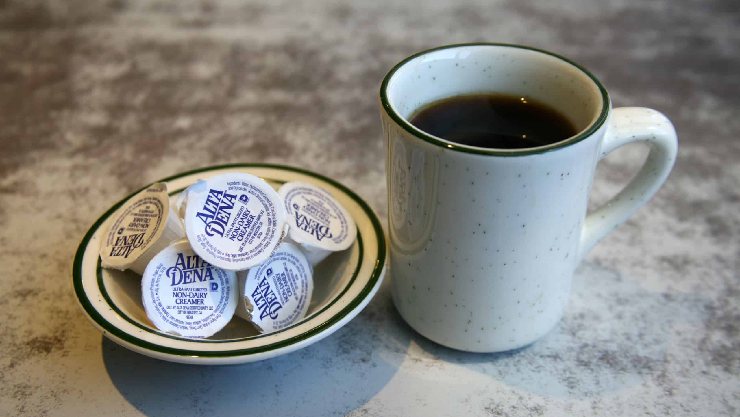 Lake Forest, California - USA - March 22-2024: Coffee. Cup of Coffee with Non Dairy Creamer. Coffee with Cream. Mug of Coffee. Breakfast. Cup of Joe. ceramic mug. Morning Go Juice. Latte. Espresso.