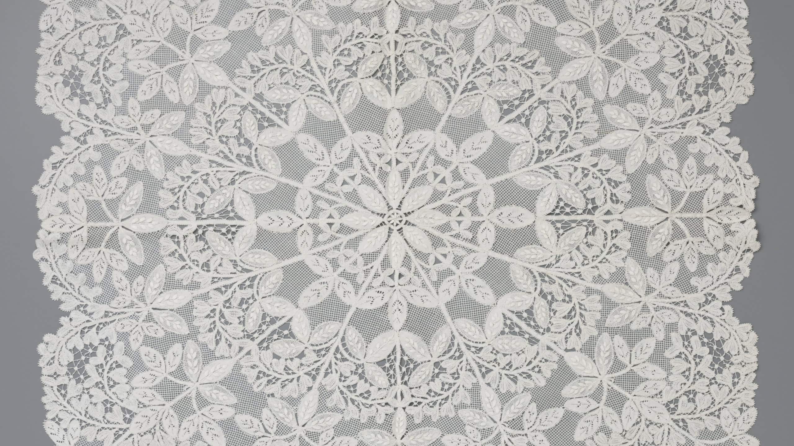 Intricate lace doily with floral pattern