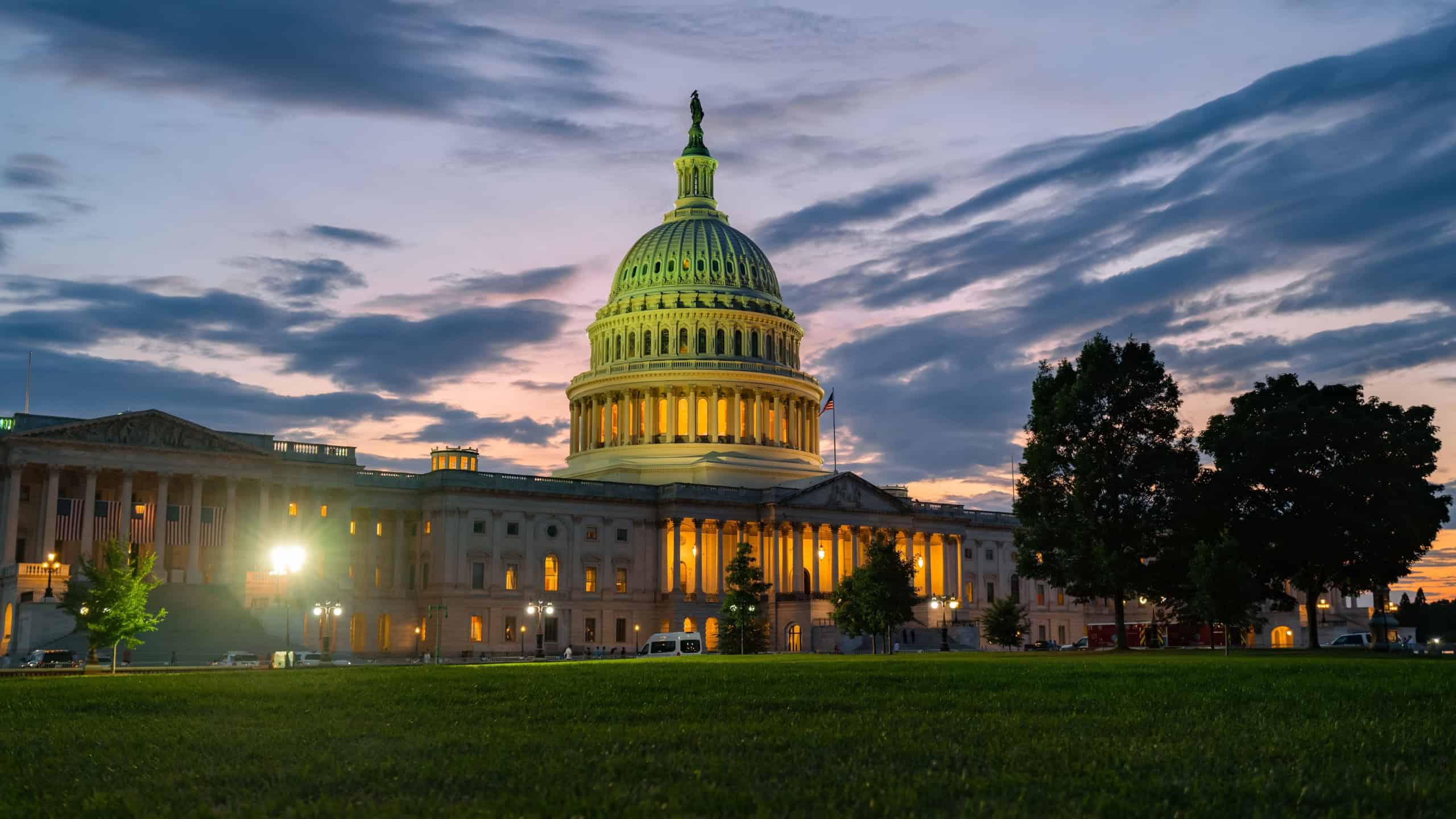 The United States Capitol as a symbol of democracy in Washington, DC. The Capitol building on Capitol Hill. US government. American flag adorns the dome of the historic Capitol. The Senate.