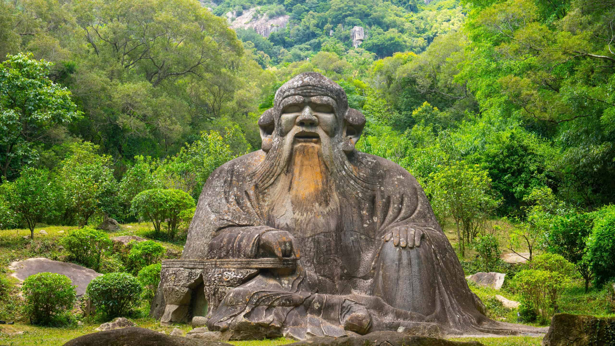 Stone statue of Laozi (Lao Tzu) at the foot of Mount Qingyuan, Quanzhou City, Fujian, China. This statue was carved one piece stone 1000 years ago, and now is a World Heritage Site.