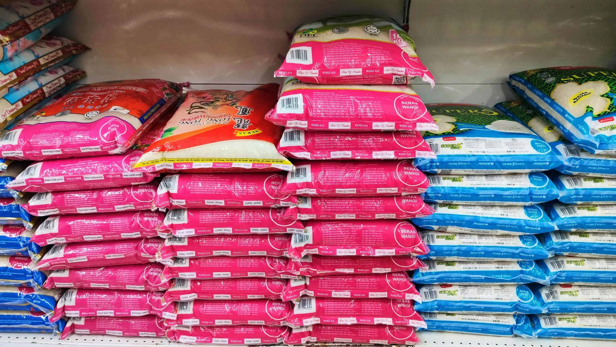 Malaysia, Kuala Terengganu 26 November 2025: A group of various local and foreign rice brands including Faiza Emas rice. selection packed of rice assorted brand for sell in the supermarket.