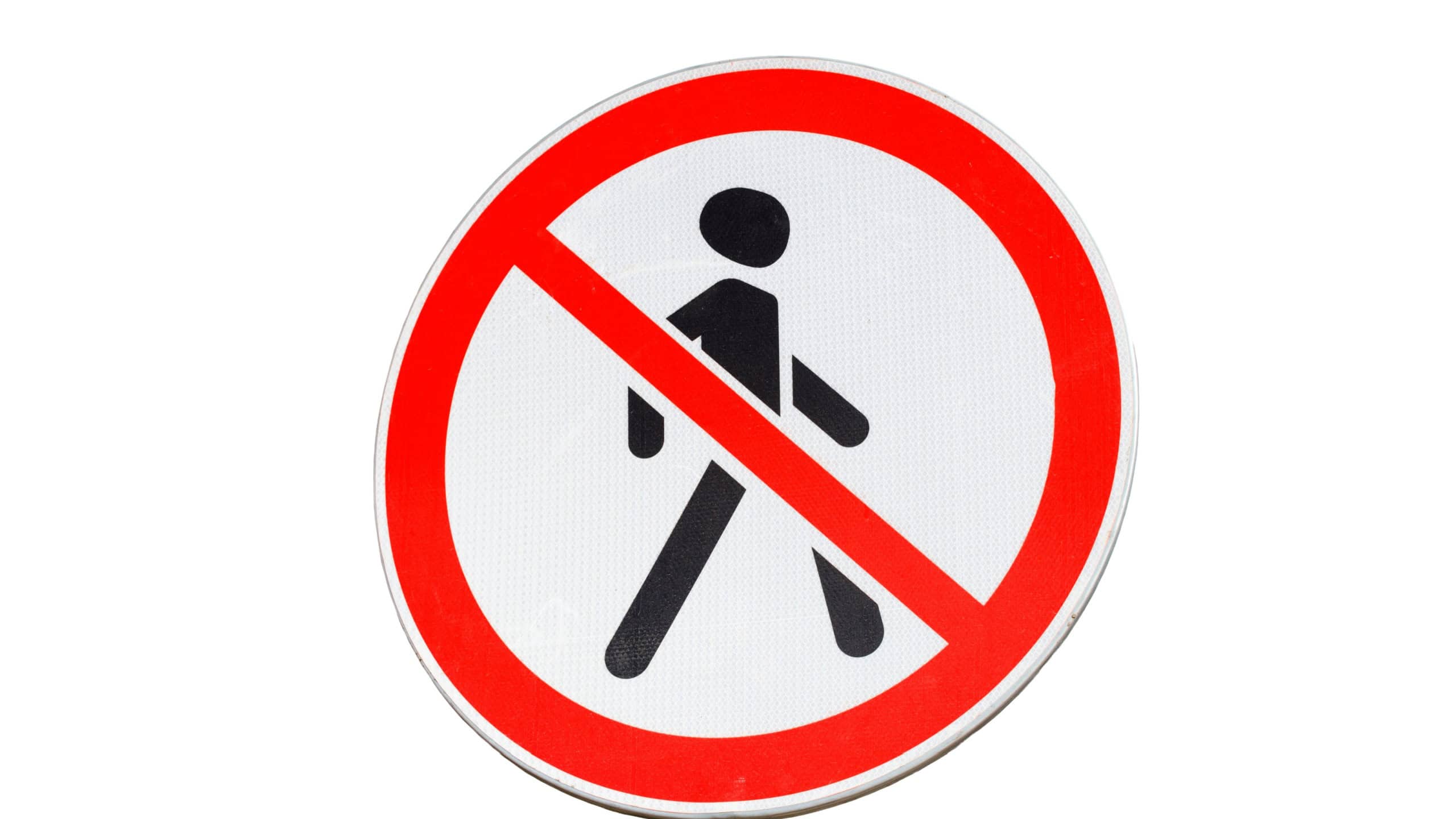 A no walking sign on a simple white background.