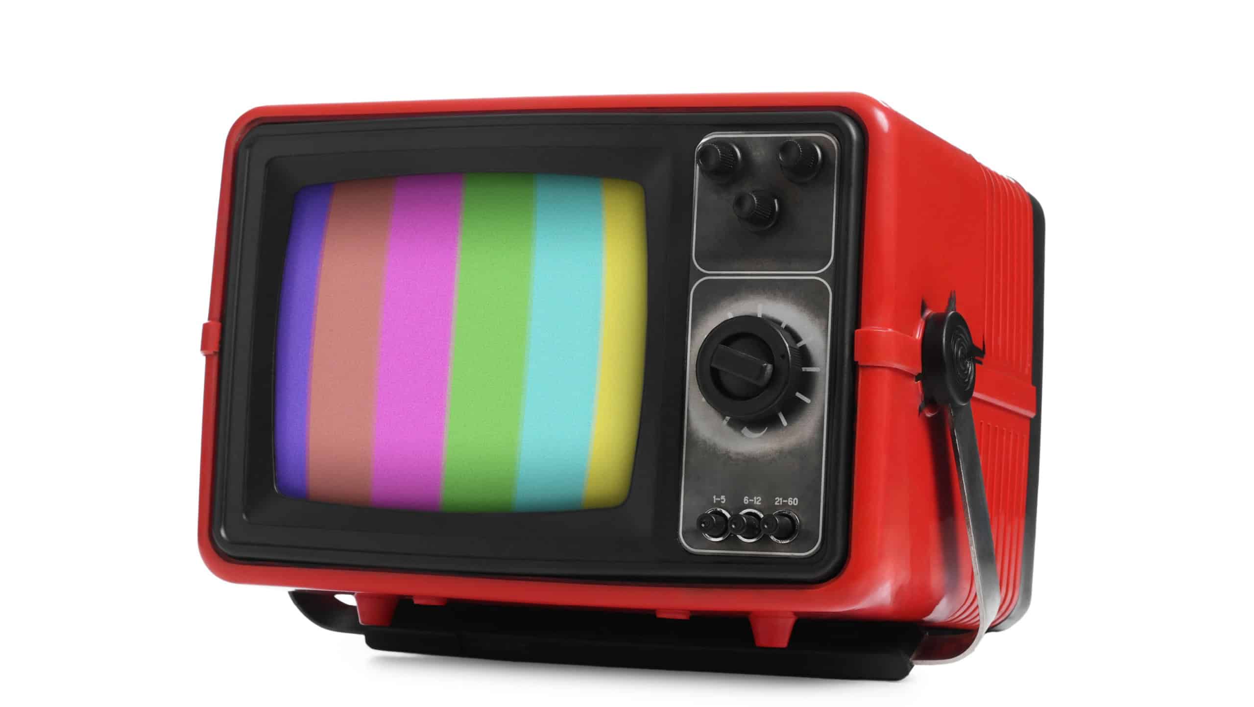 Old TV with color bars test card on screen. White background