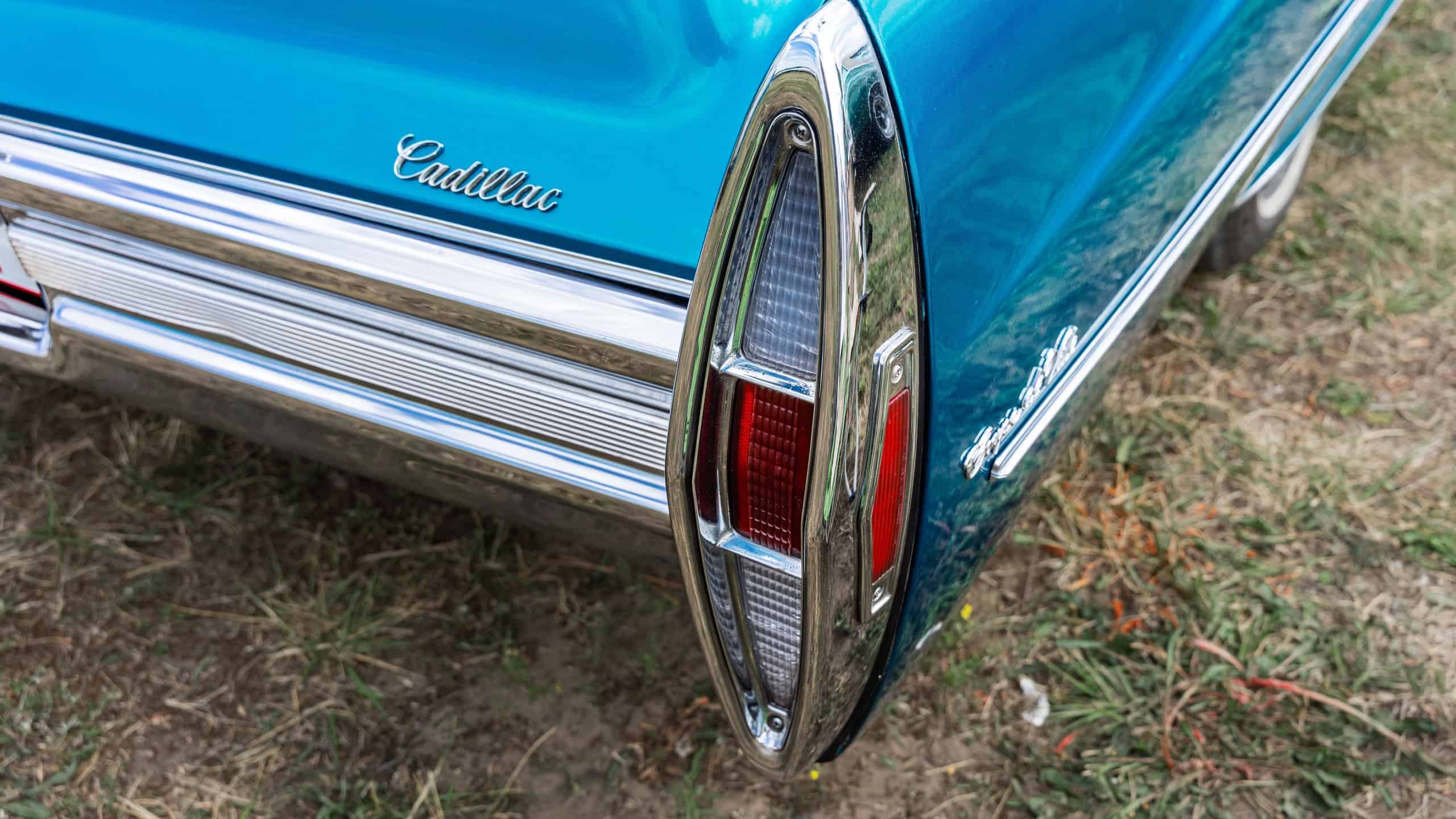 Classic full‑size car Cadillac Coupe de Ville tail fin detail.