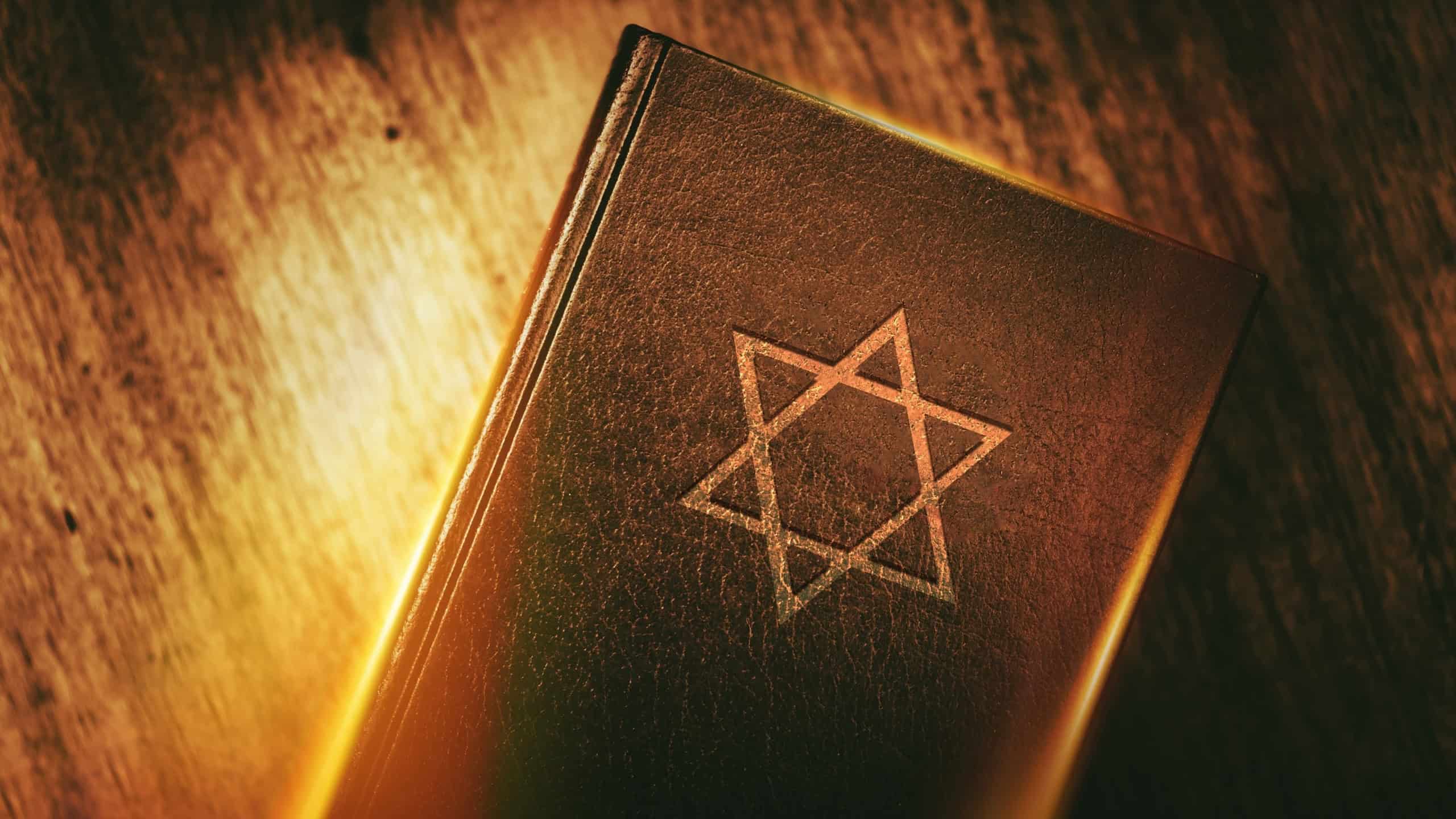 The Book of Judaism. Ancient Prayer Book with Judaism Star of David Symbol on Cover.