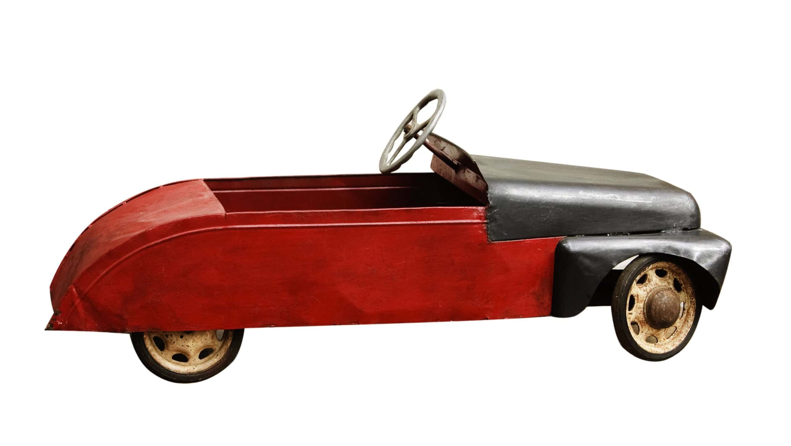 antique toy car isolated on a white background