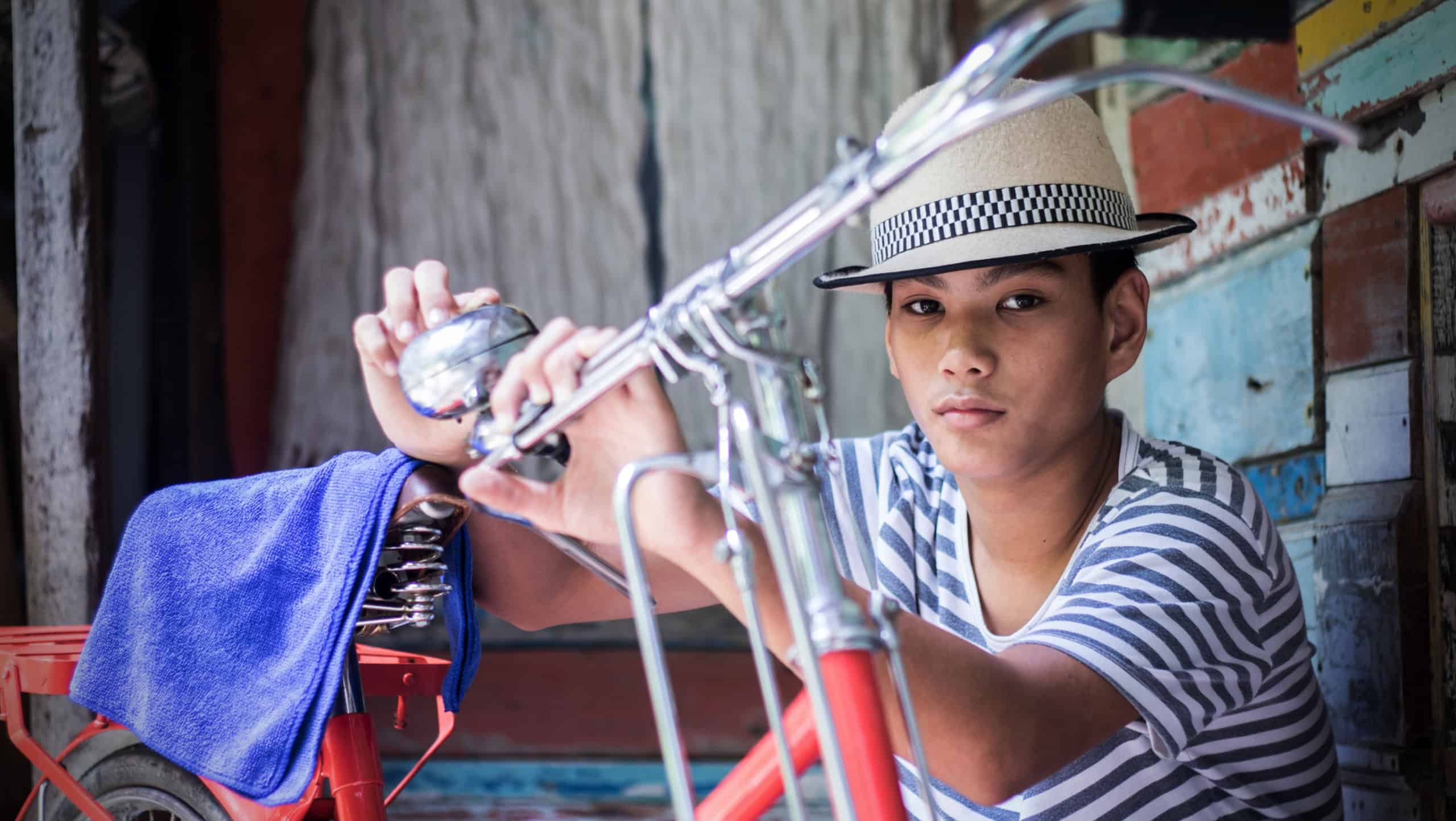 boy and vintage bicycle