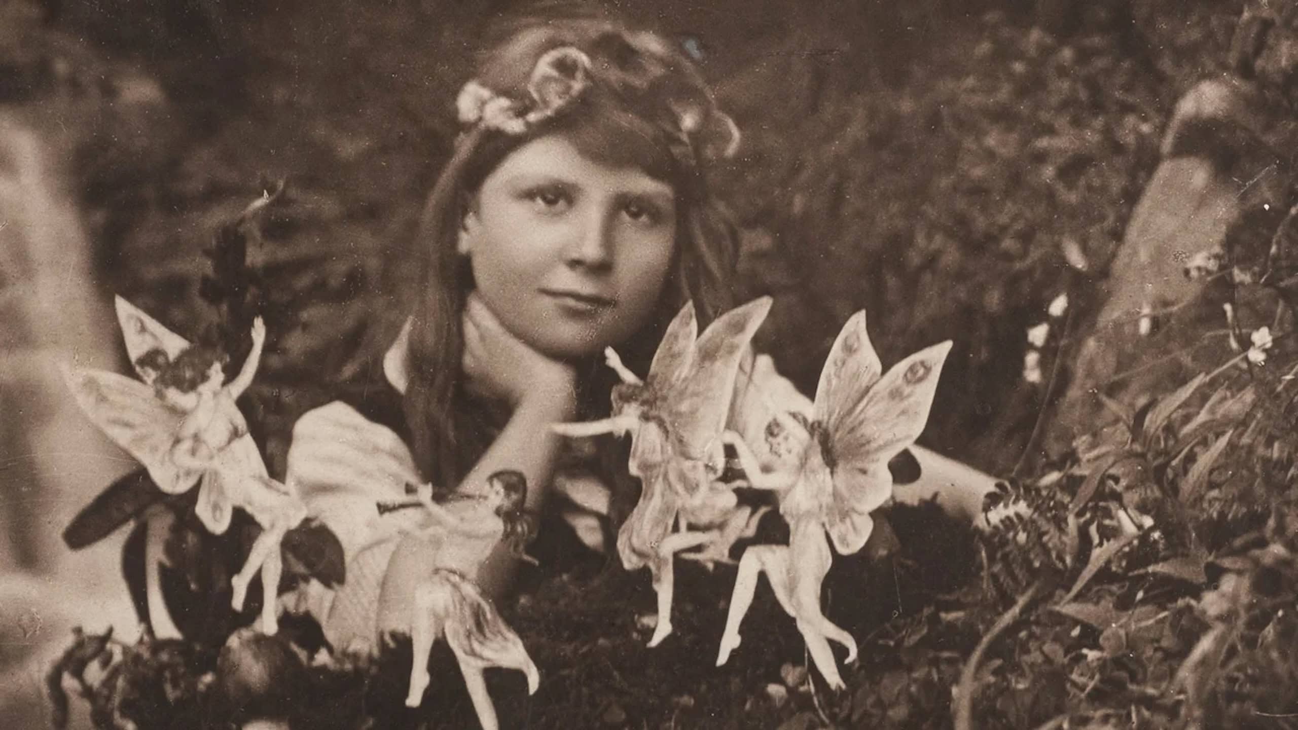 The first of the five photographs, taken by Elsie Wright in 1917, shows Frances Griffiths with the alleged fairies.