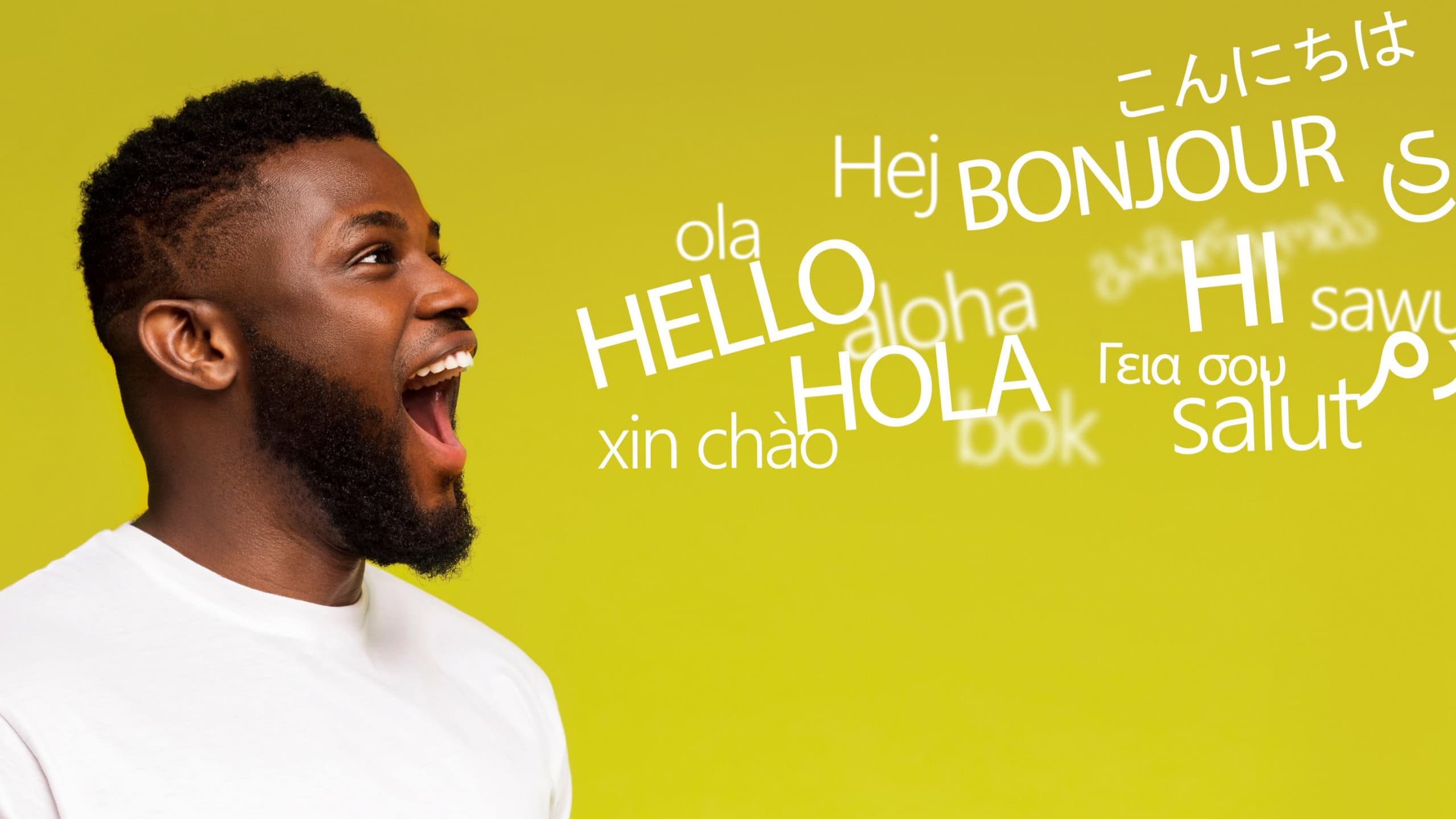 Courses concept. Young millennial afro man saying hello in many languages on yellow background