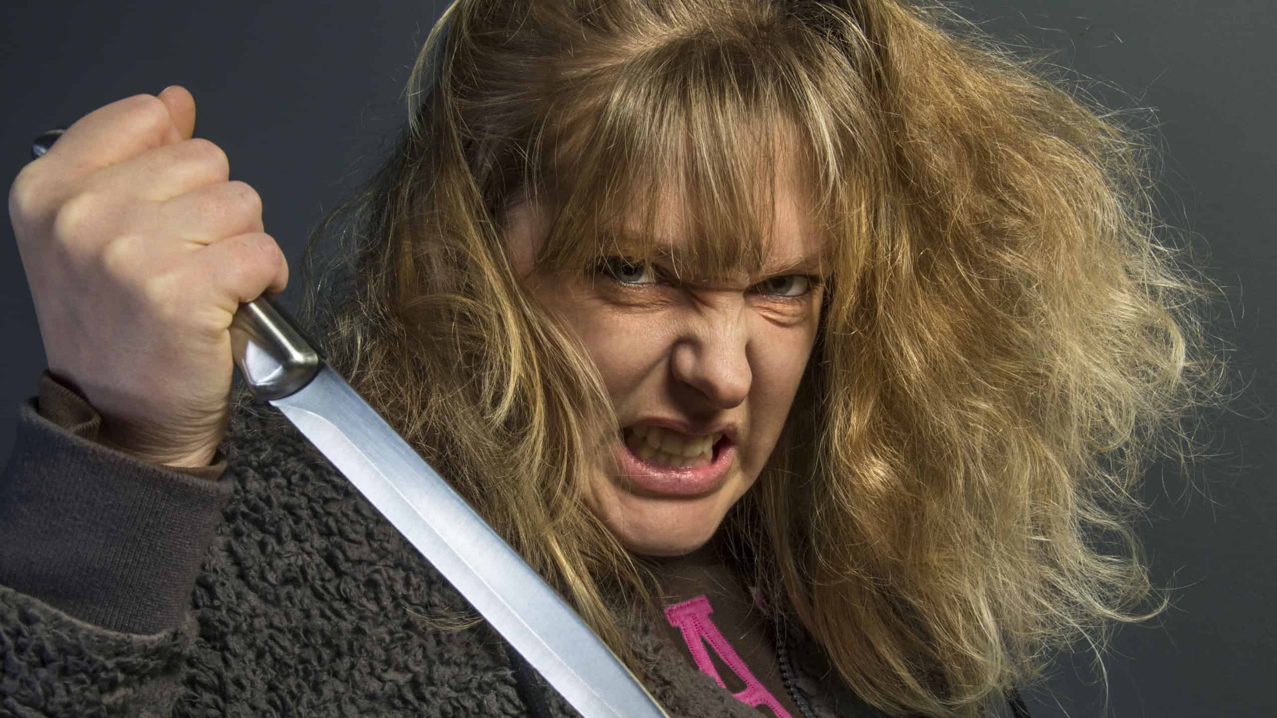 A crazy psychotic young woman - domestic violence