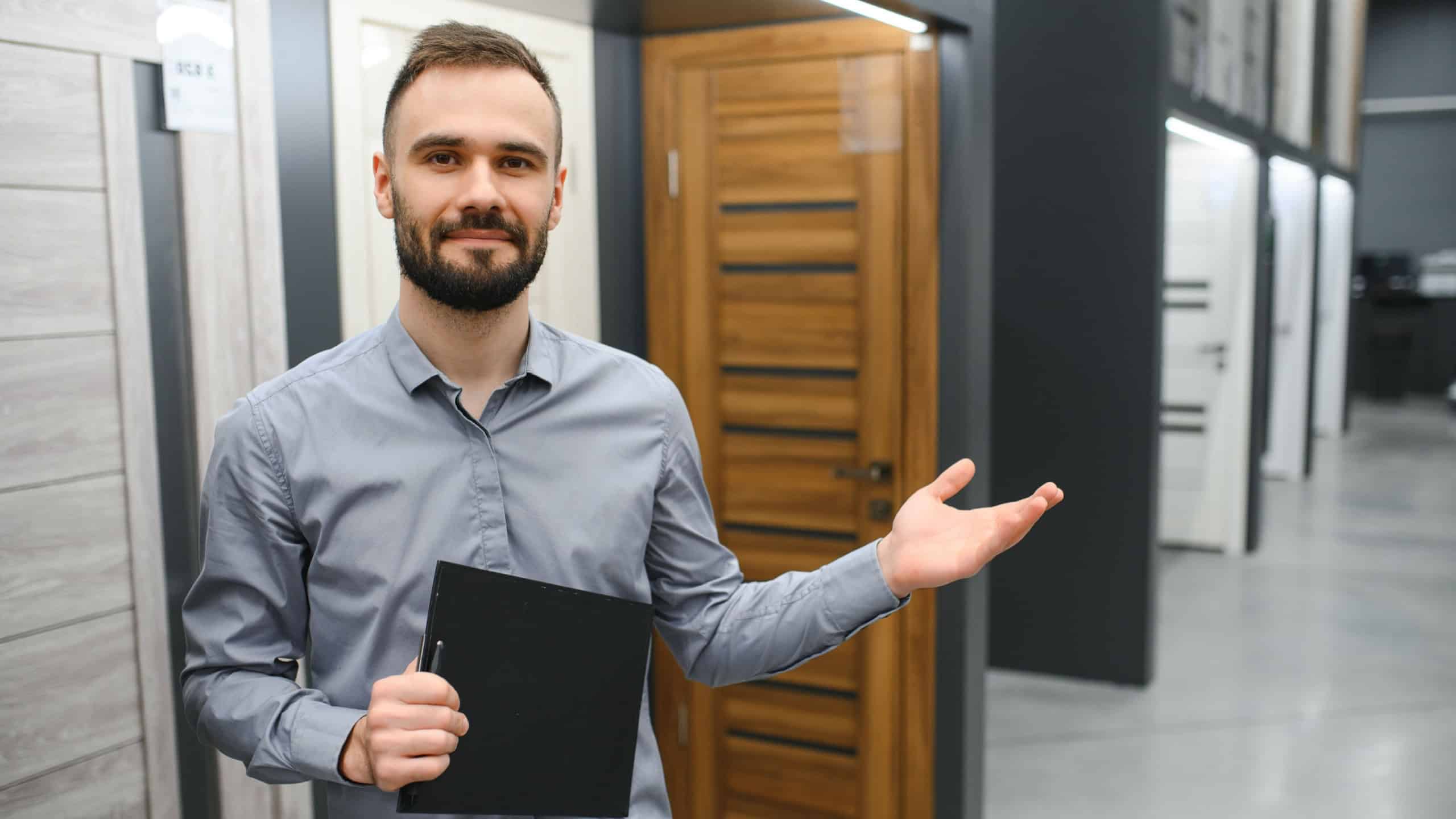 sales consultant standing near the interior door.