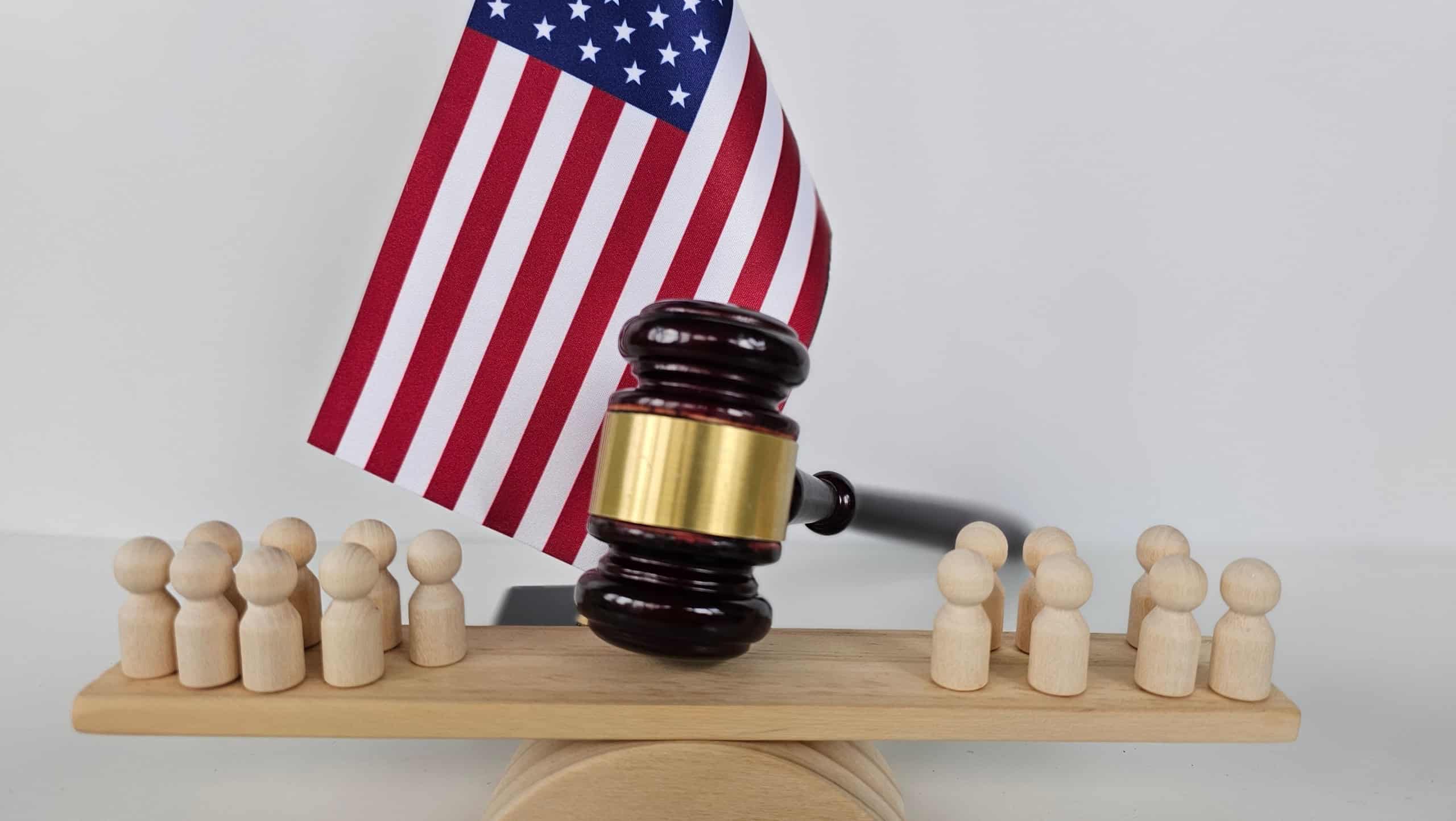 Judge gavel and flag of United States of America and society or migrants. Lawyer code and law on sentencing presidential elections 2024