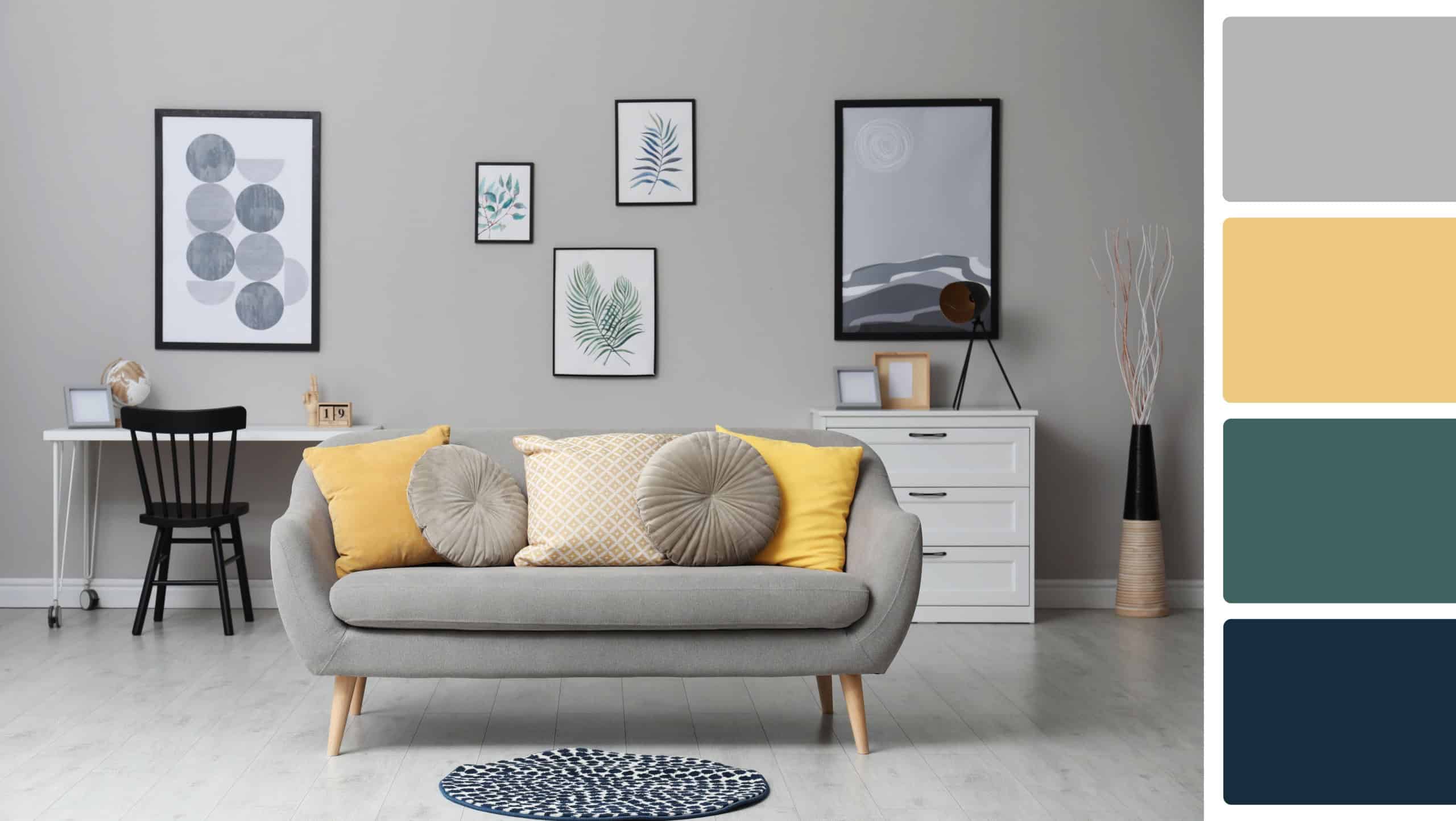 Stylish living room with comfortable sofa near grey wall. Interior design and matching color palette