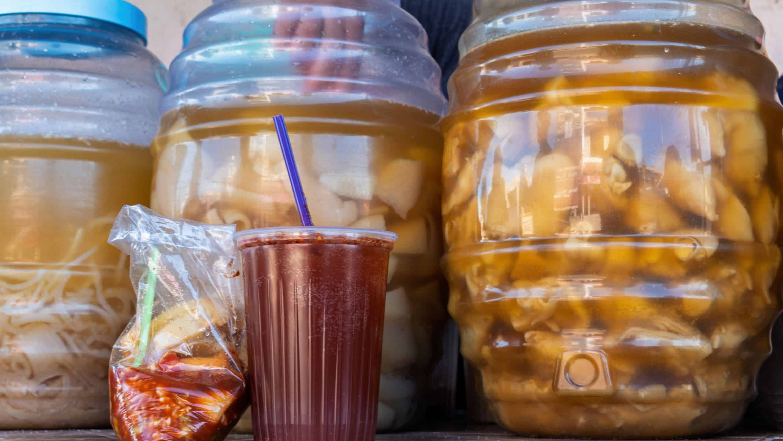 Mexican Delicacies: Pickled Pig's Feet and Spicy Michelada Delight