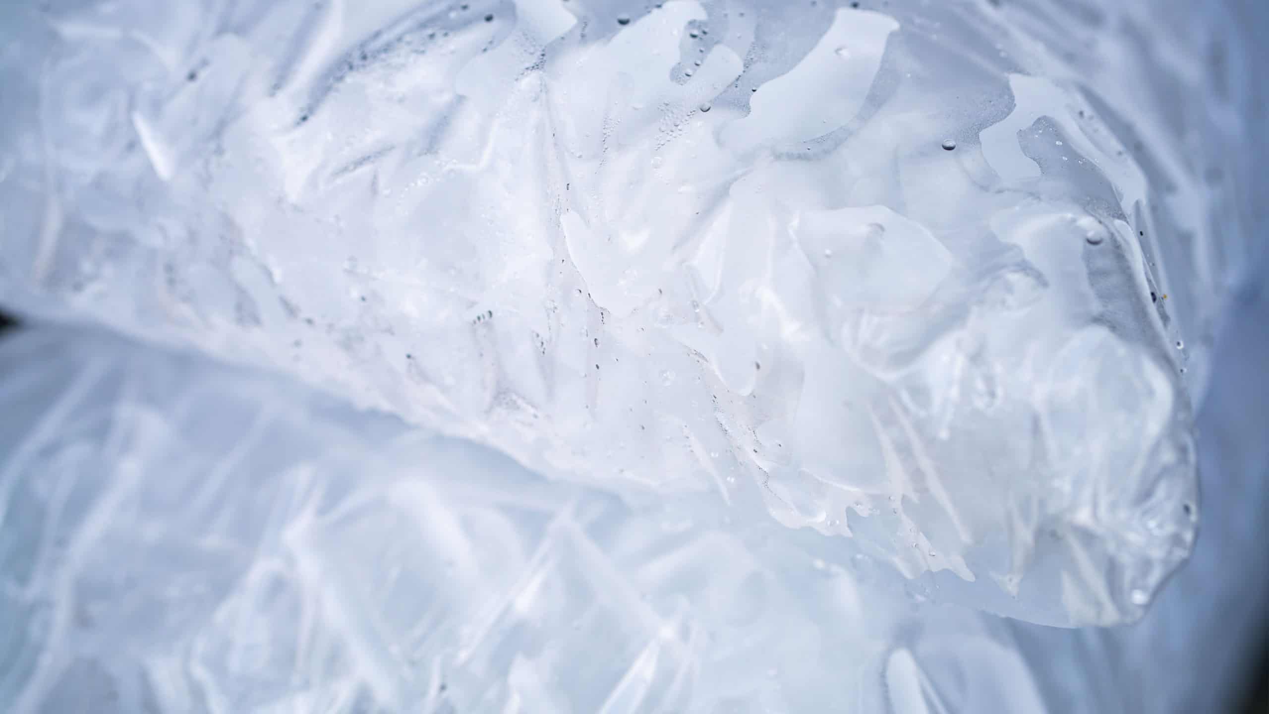 Closeup of tube ice inside a clear plastic bag. Convenient and lightweight packaging designed for easy transportation and storage. Hygiene and freshness for commercial and industrial applications.