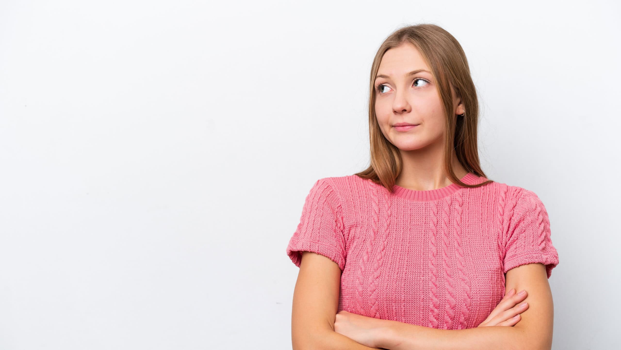 Young Russian woman isolated on white background making doubts gesture while lifting the shoulders