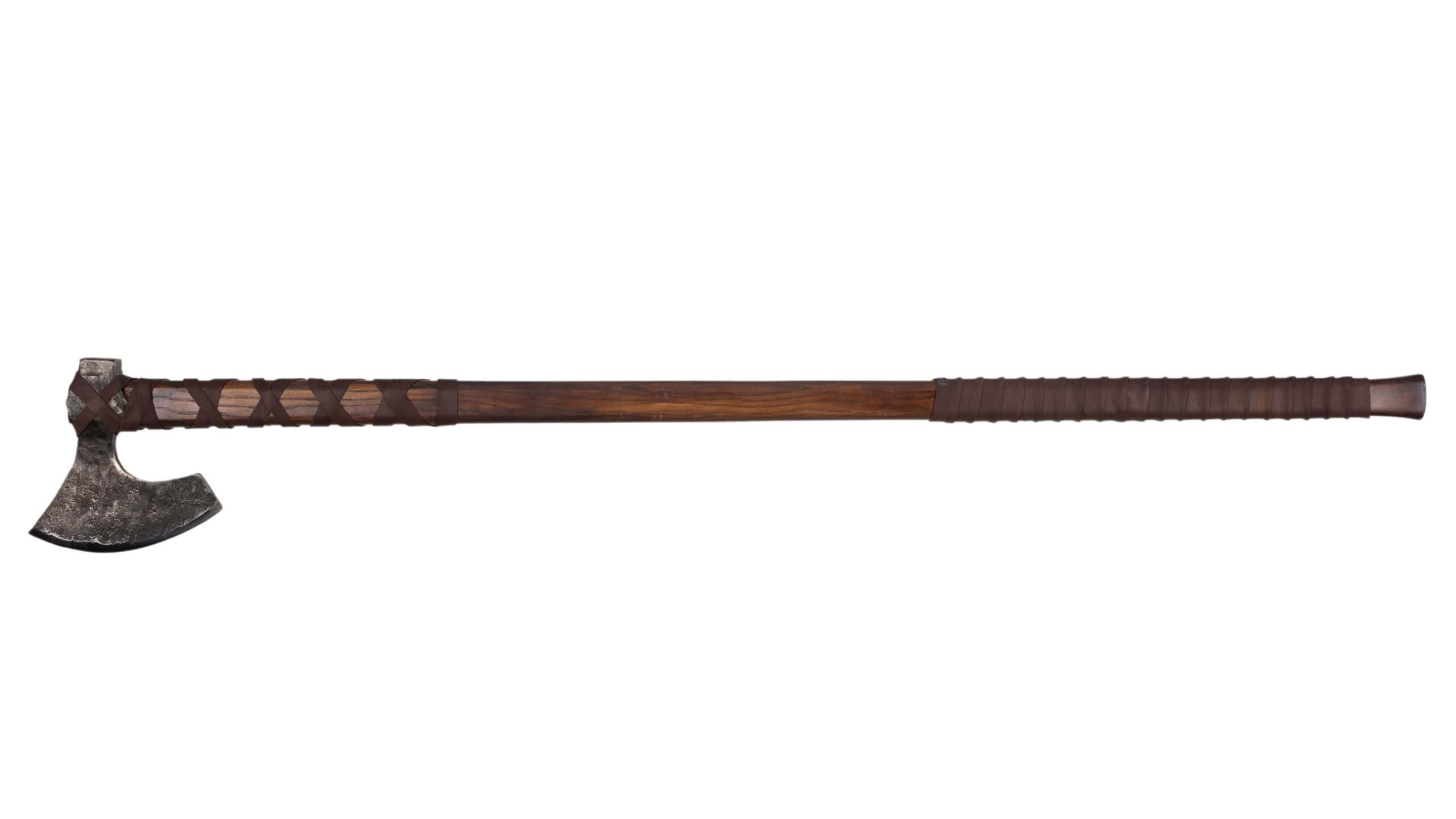 Antique battle axe with long wooden handle on white background