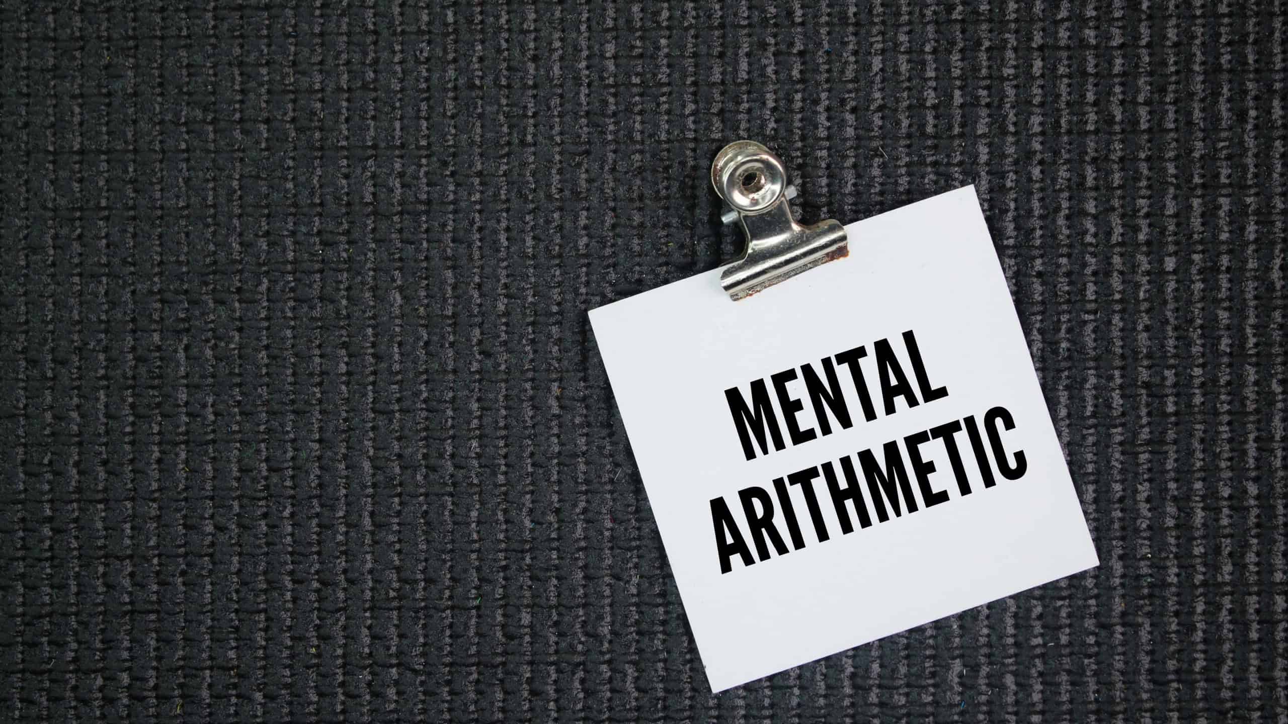 White paper with the word mental arithmetic arithmetical calculations performed in the mind without writing figures down or using a calculator