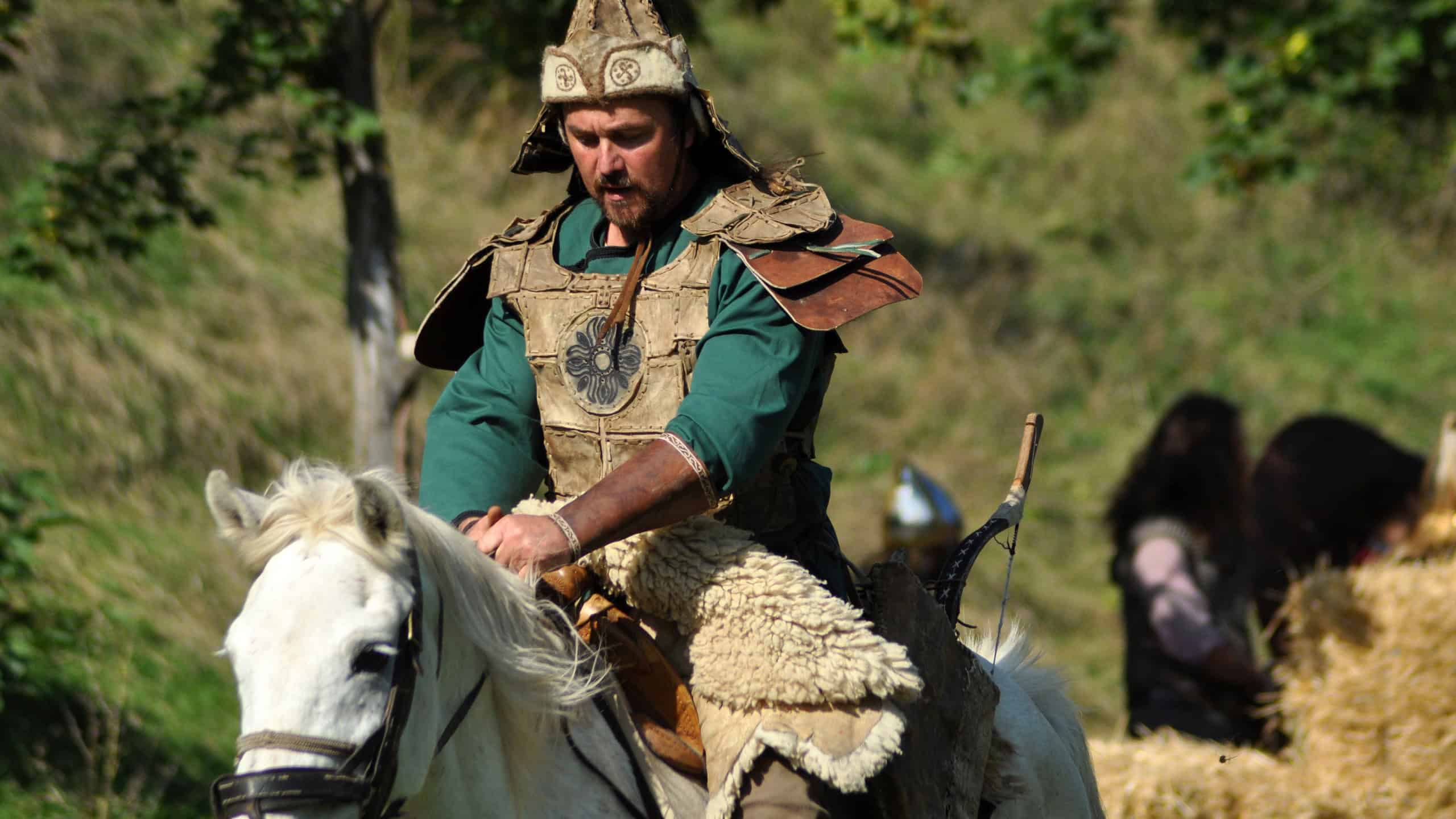 Members of Eagles of Calata Nomadic group performing a free equestrian demonstration with Hunnic and archaic Hungarian costumes.