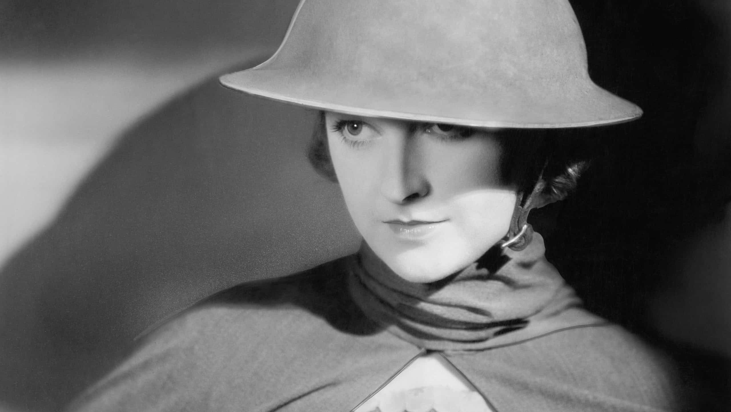 Woman in an army helmet and uniform