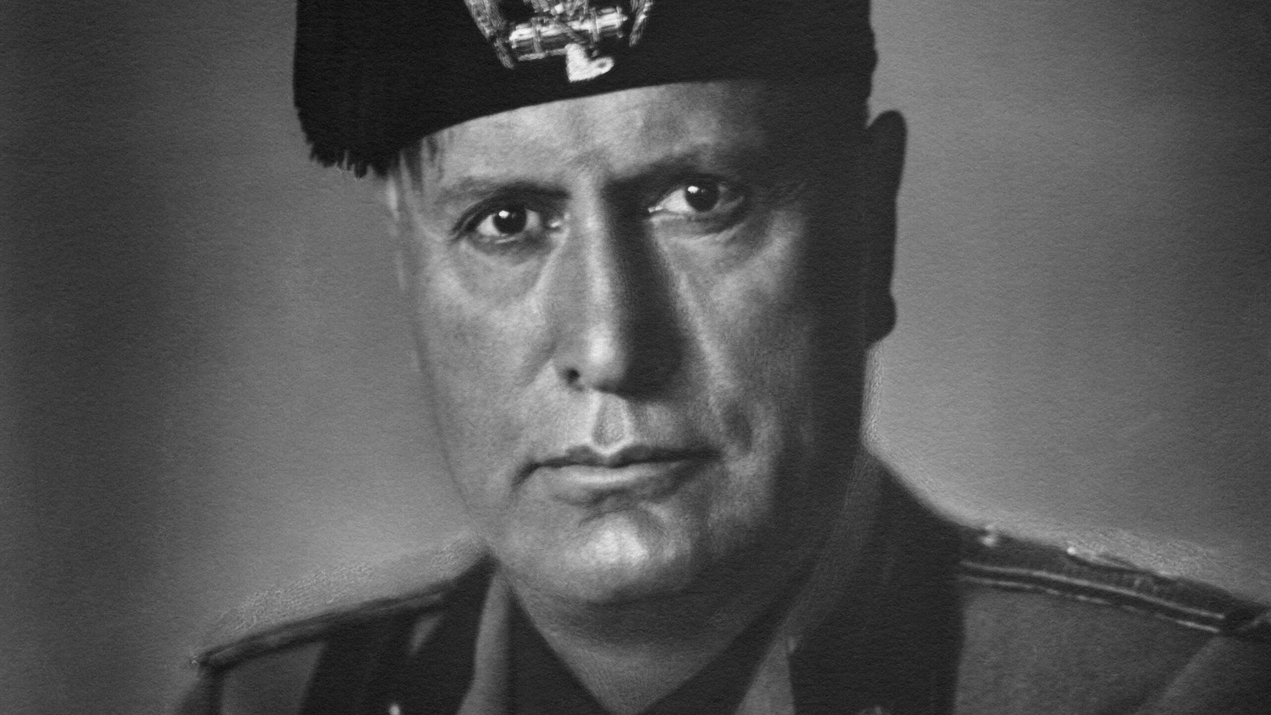 Benito Mussolini, the leader of the fascist Kingdom of Italy.