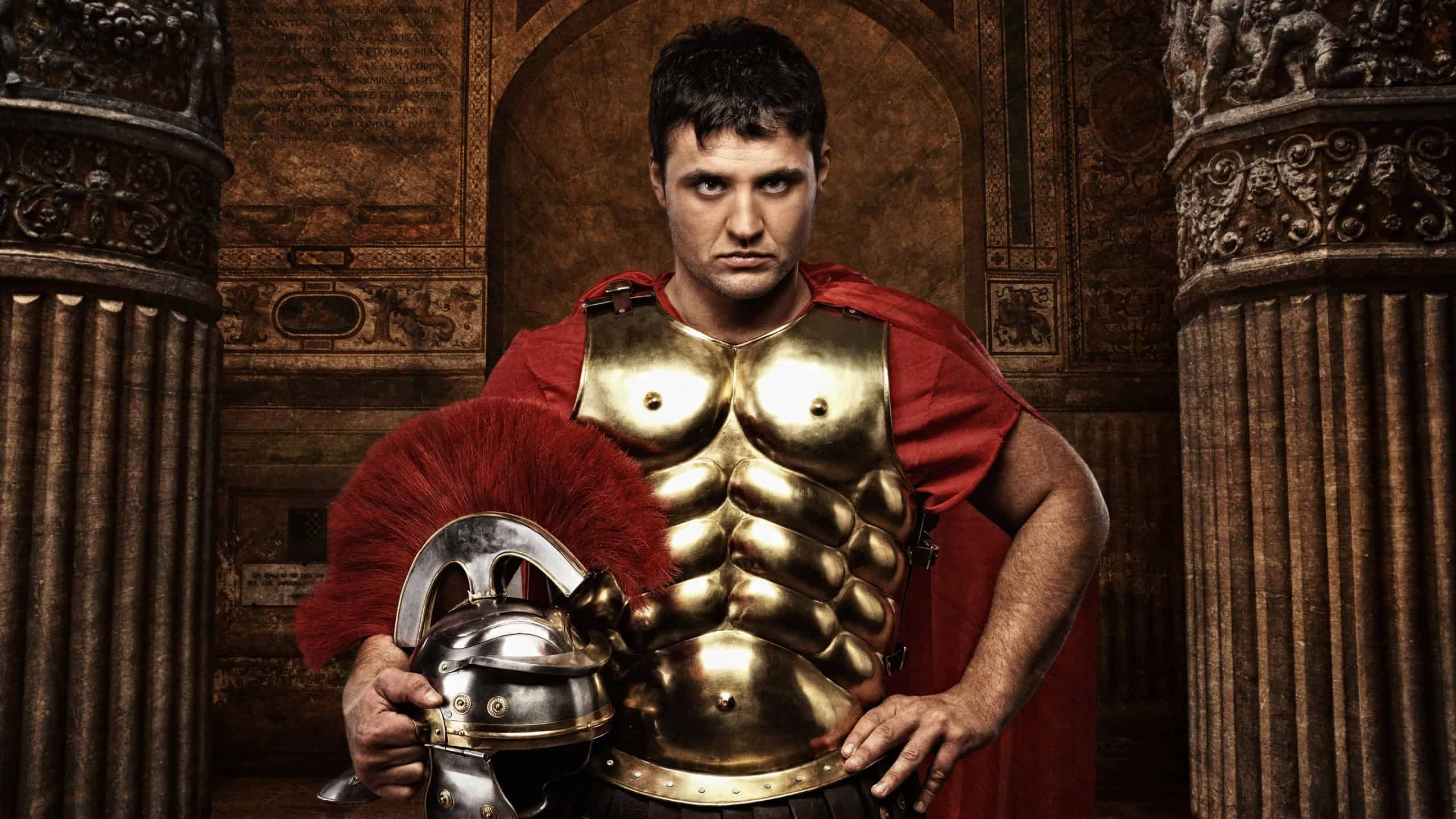 Roman soldier against antique building.