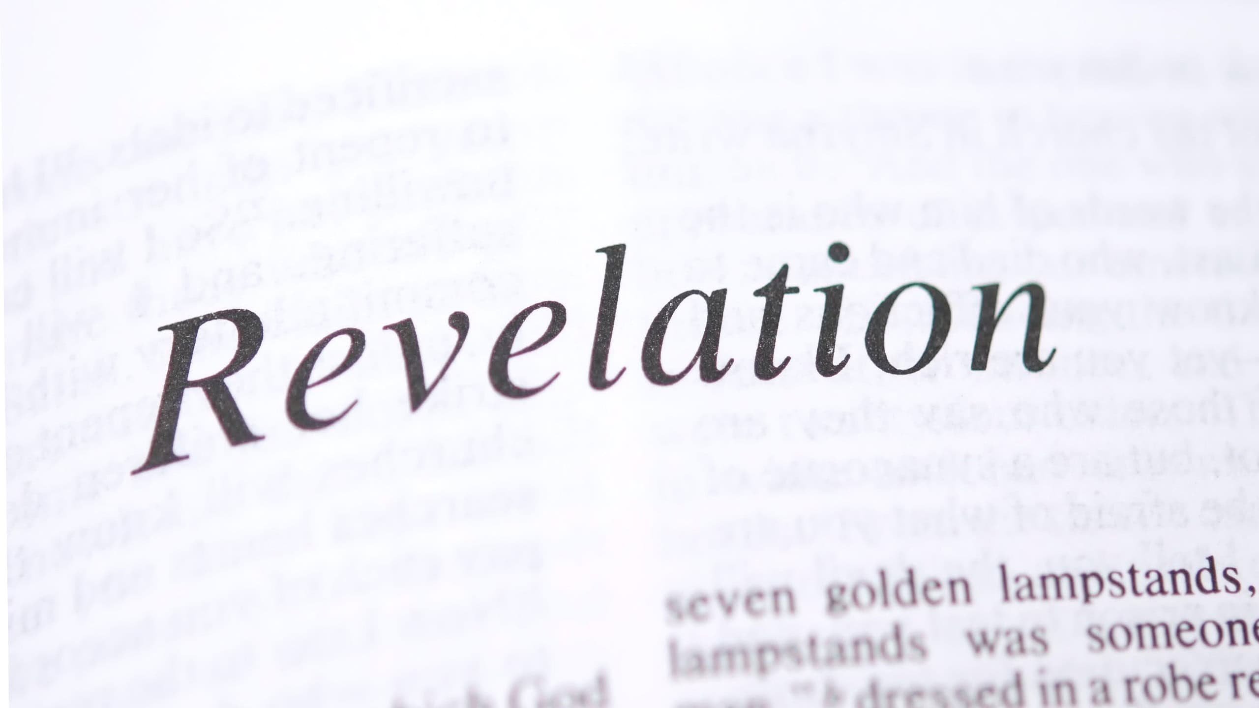 Reading Revelation in Holy Bible on sunday readings