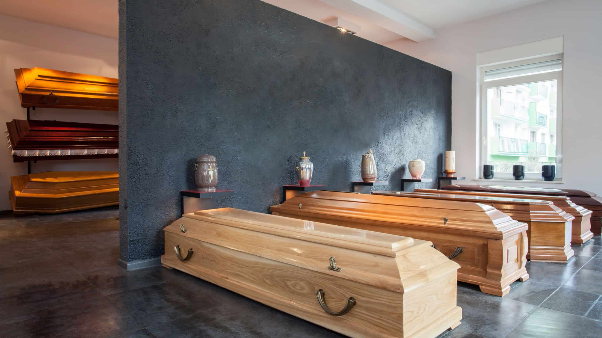 Coffins standing in funeral house