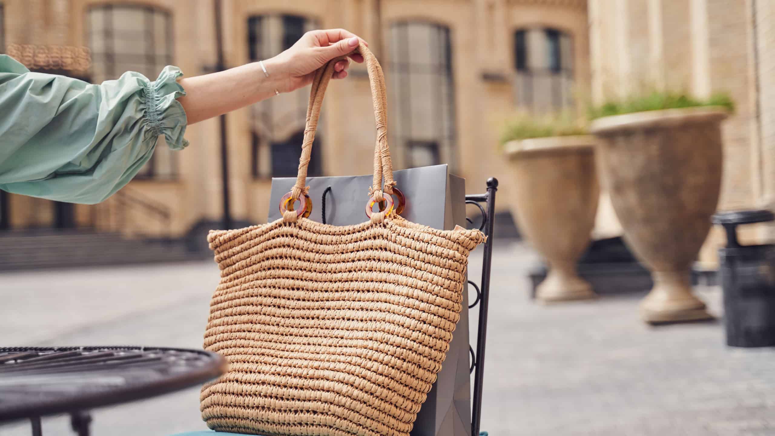 Close up shot of woman holding bag