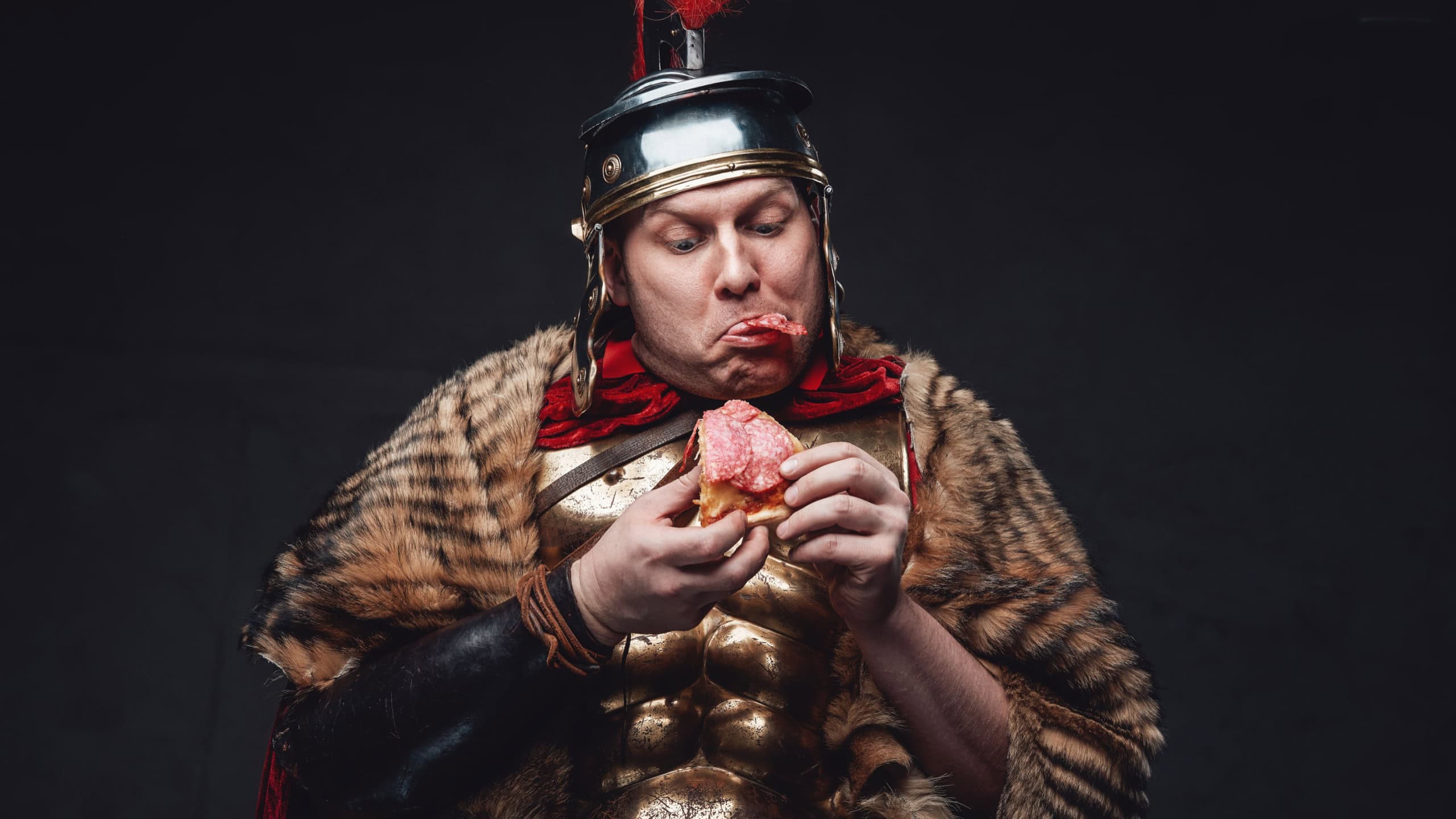 Ancient legionary with pizza and glad face