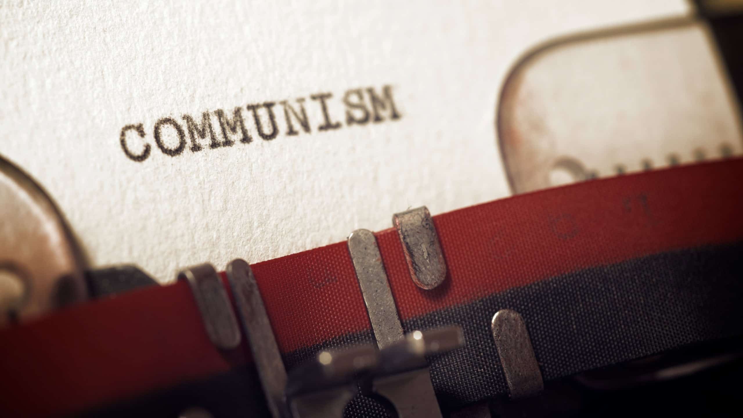 The word communism written with a typewriter.