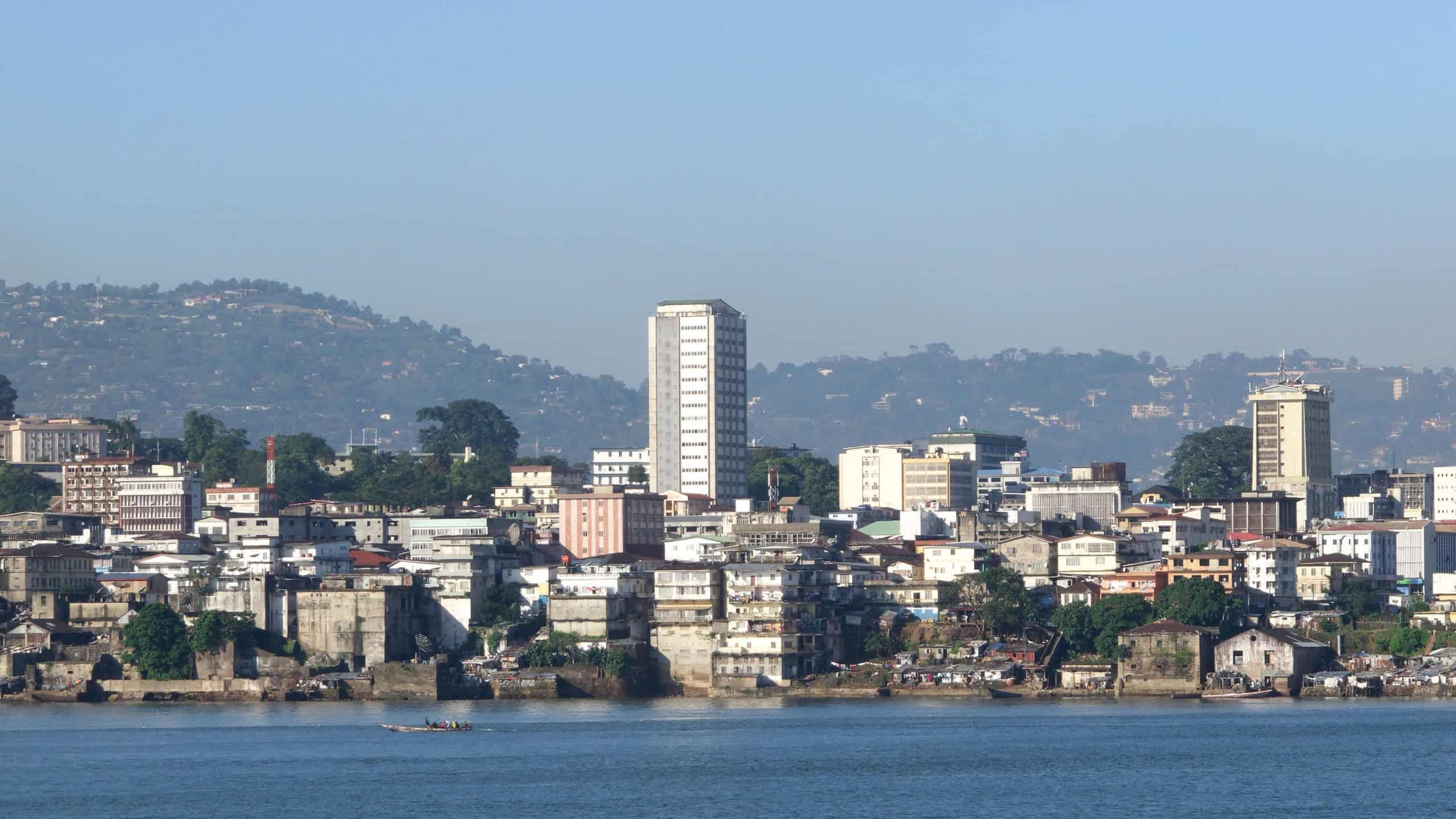 A drone shot of residential buildings in the Freetown harbor in Sierra Leone