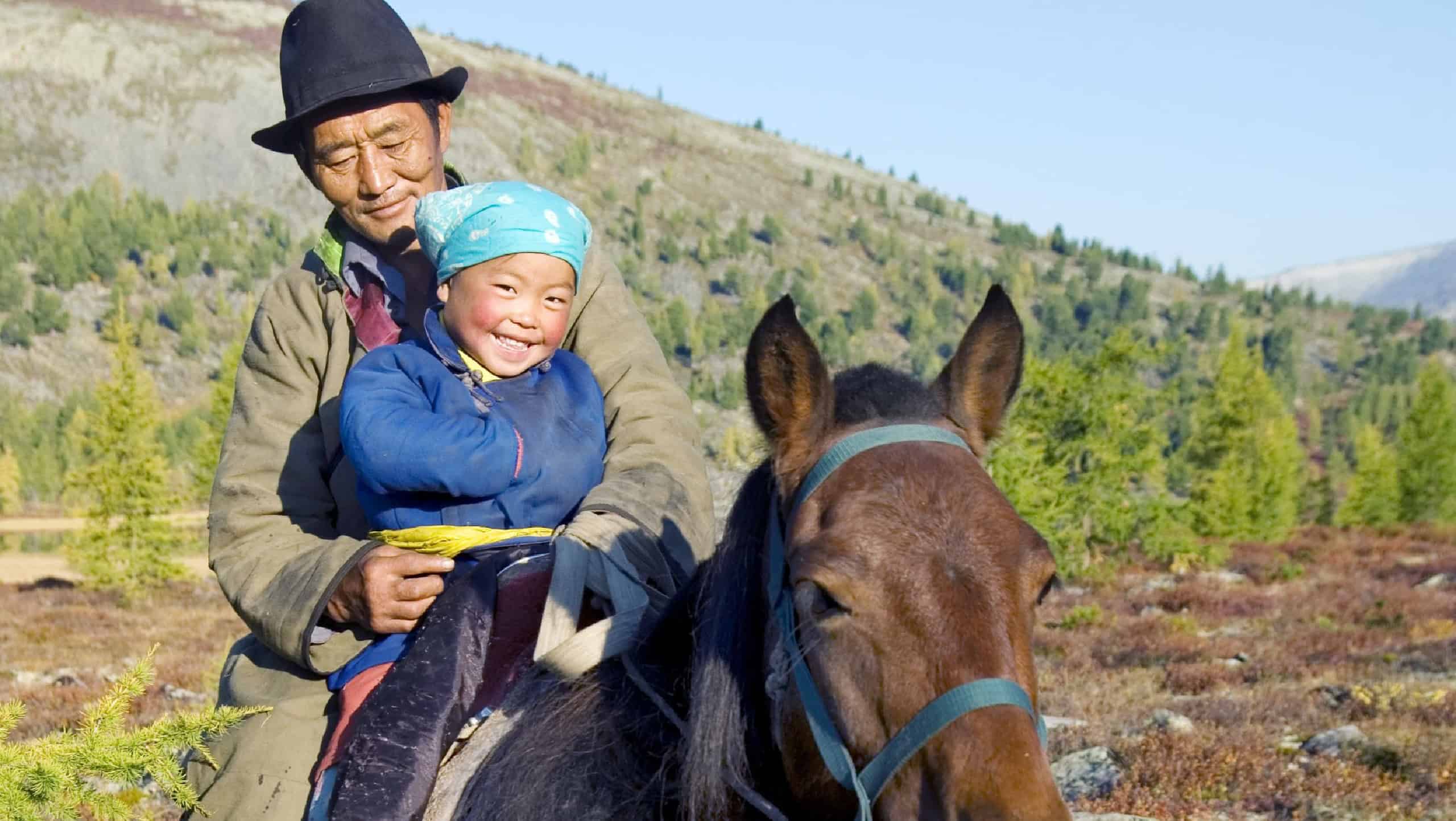 Nomadic Tsaatan or Dukha (Reindeer people) of northern Mongolia. The Tsaatan's survival is threatened by environmental damage to the forest where they live and hunt. Khovsgol aimag, Mongolia.