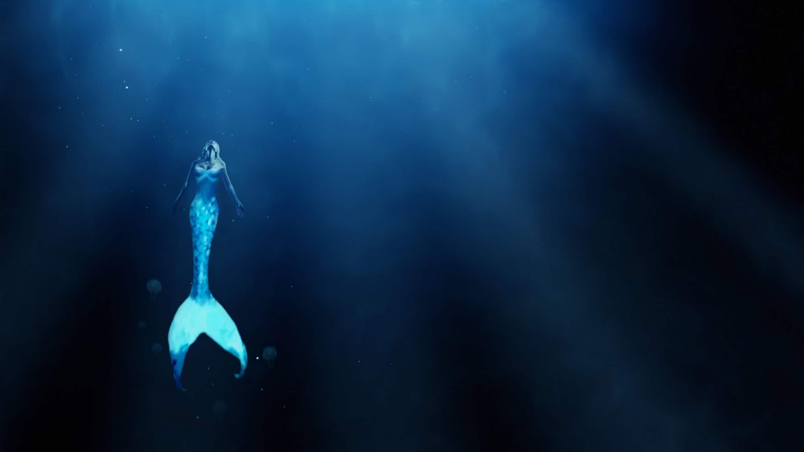 Mermaid, fantasy and underwater with fish woman, siren and scales of sea person. Ocean, mysterious and goddess figure of female creature, aqua and swimming in blue water or surreal artistic illusion