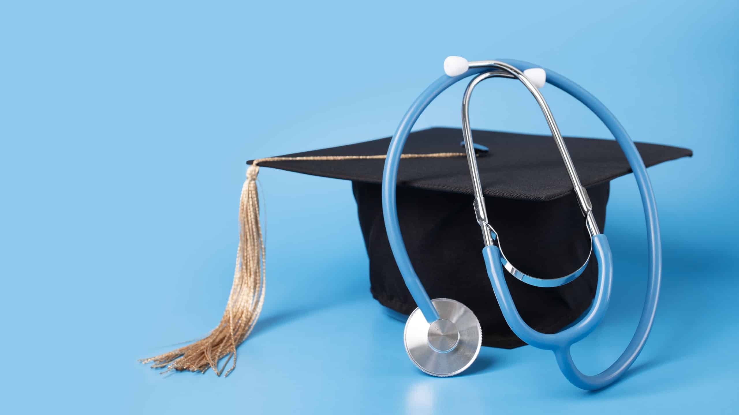 Medical education, graduation cap and doctor's stethoscope, graduate with diploma celebrating academic achievement, university ceremony with health professionals