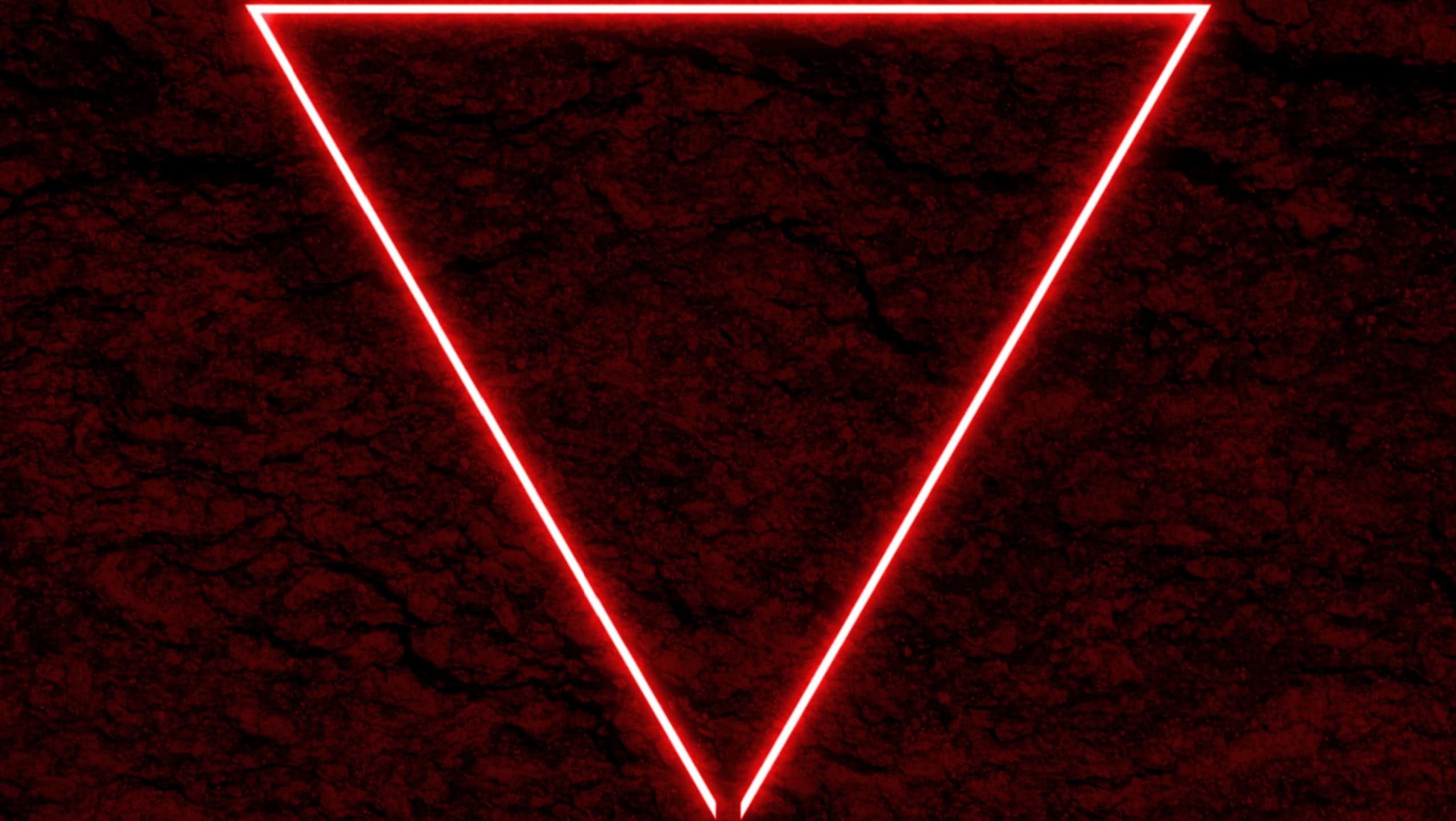 Red dark background and stone texture. natural background pattern with glowing neon light and triangle frame.