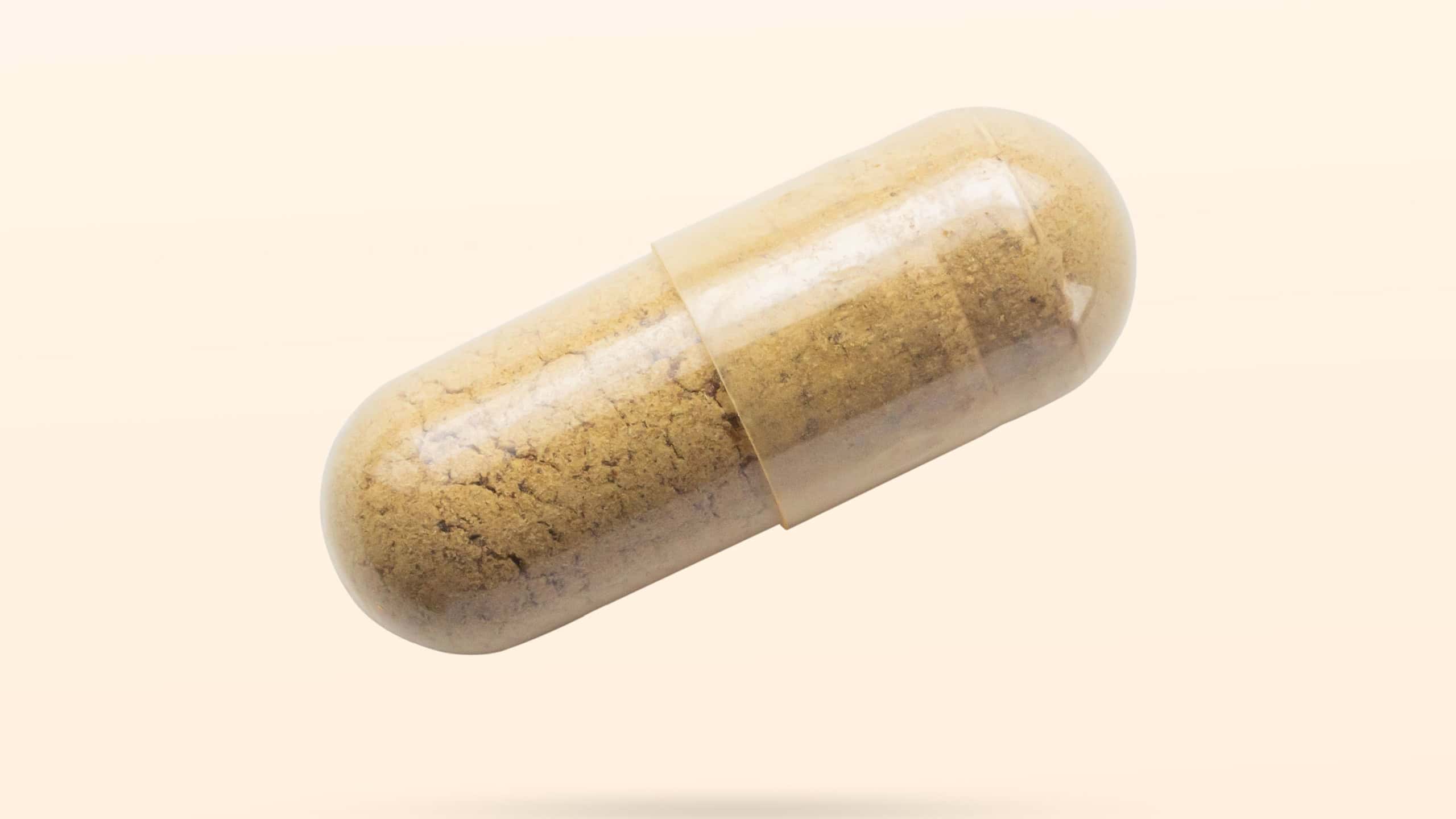 Capsule flying on brown background