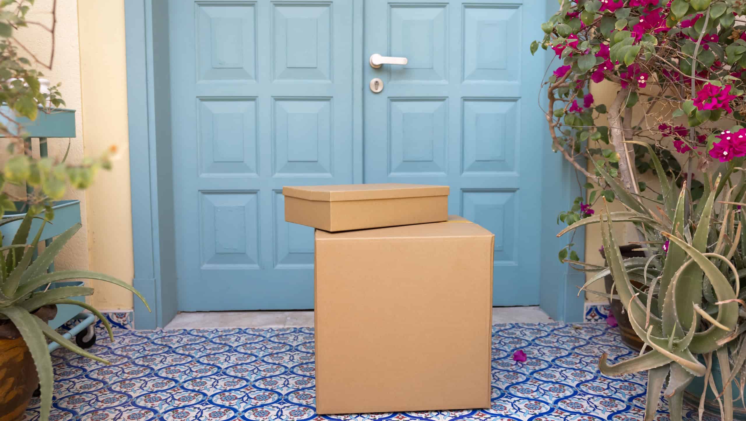 Two sealed, neatly placed packages on recipient house porch, close up, no people. Contactless, express, trustworthy doorstep delivery services, convenience in e-commerce logistics, online shopping