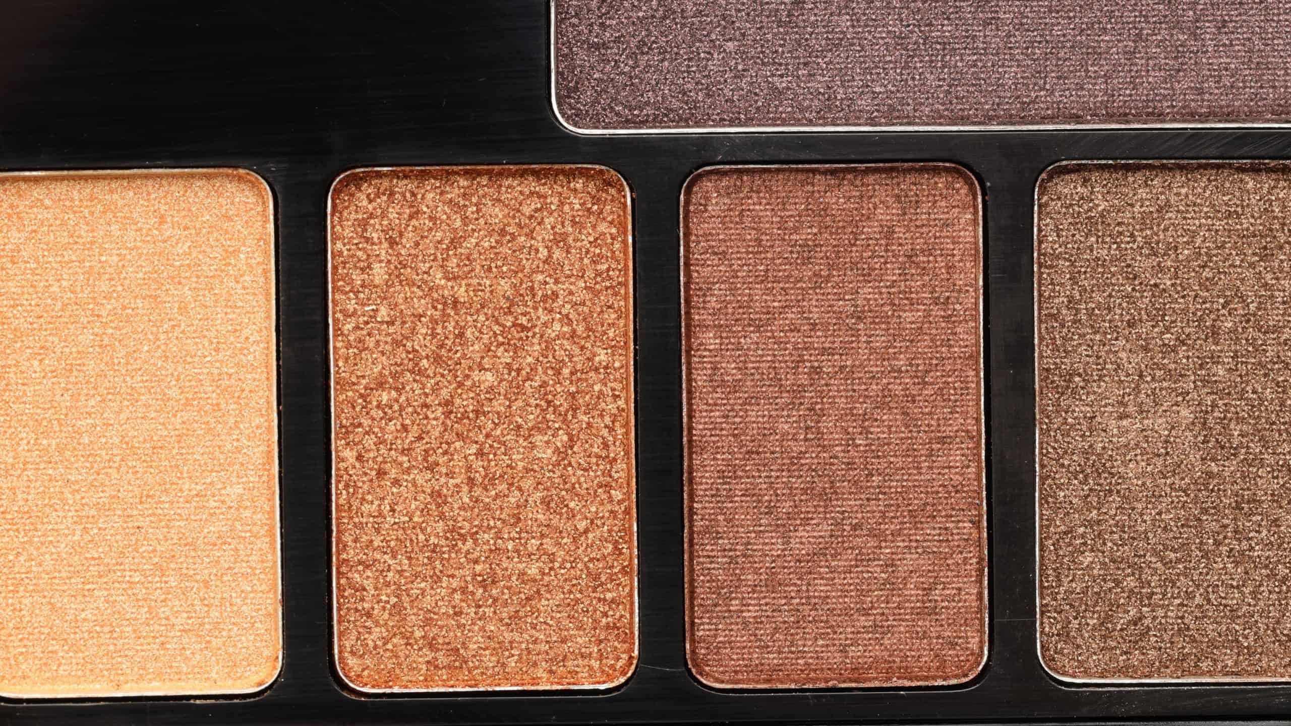 Beautiful eyeshadow palette as background, top view