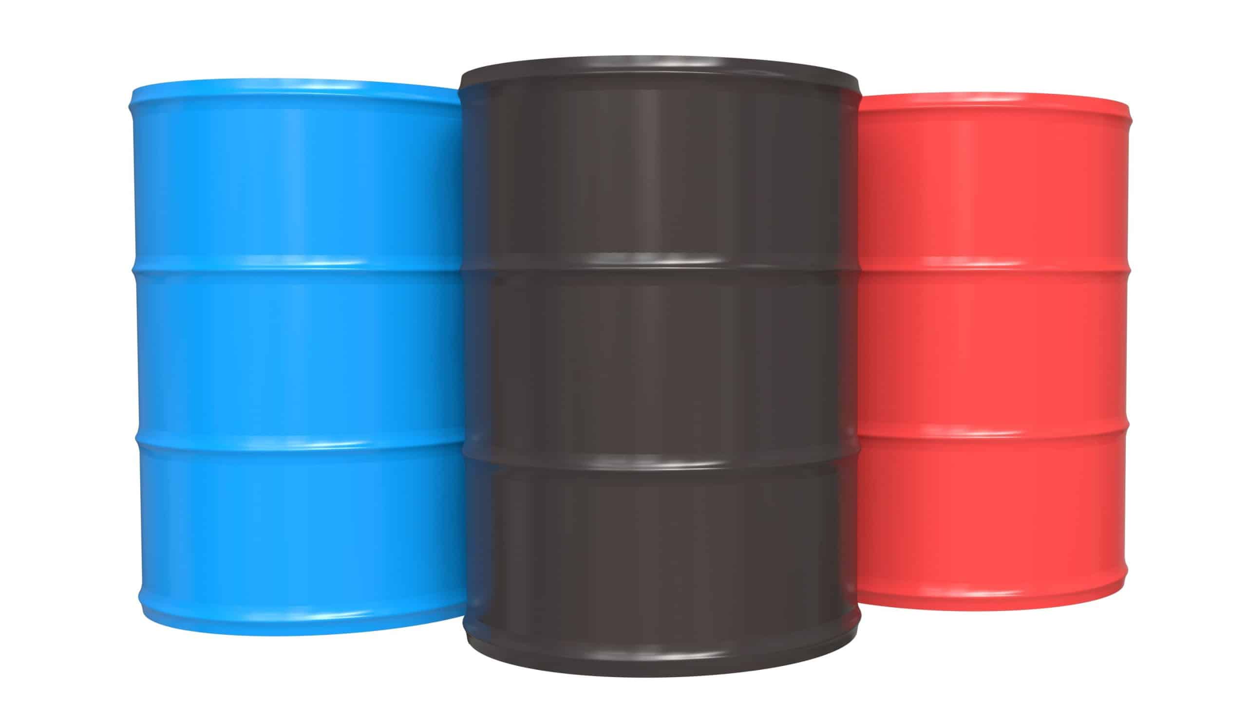 Three colorful industrial metal oil barrels, blue black and red steel drums for petroleum storage, fuel industry container concept